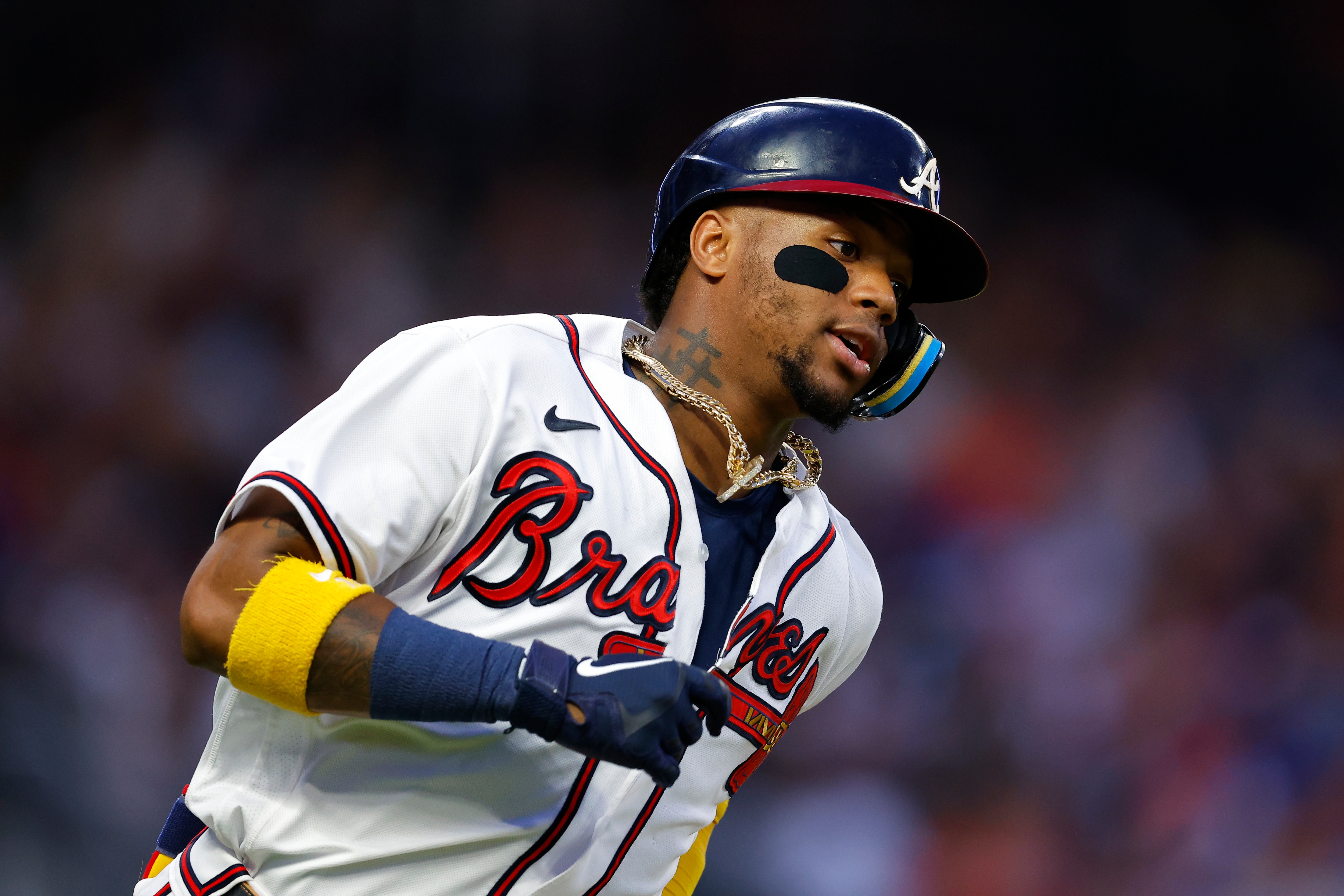 ATLANTA, GA - JUNE 25: Ronald Acuna Jr. #13 of the Atlanta Braves races to first for a single during the fifth inning against the Los Angeles Dodgers at Truist Park on June 25, 2022 in Atlanta, Georgia. (Photo by Todd Kirkland/Getty Images)