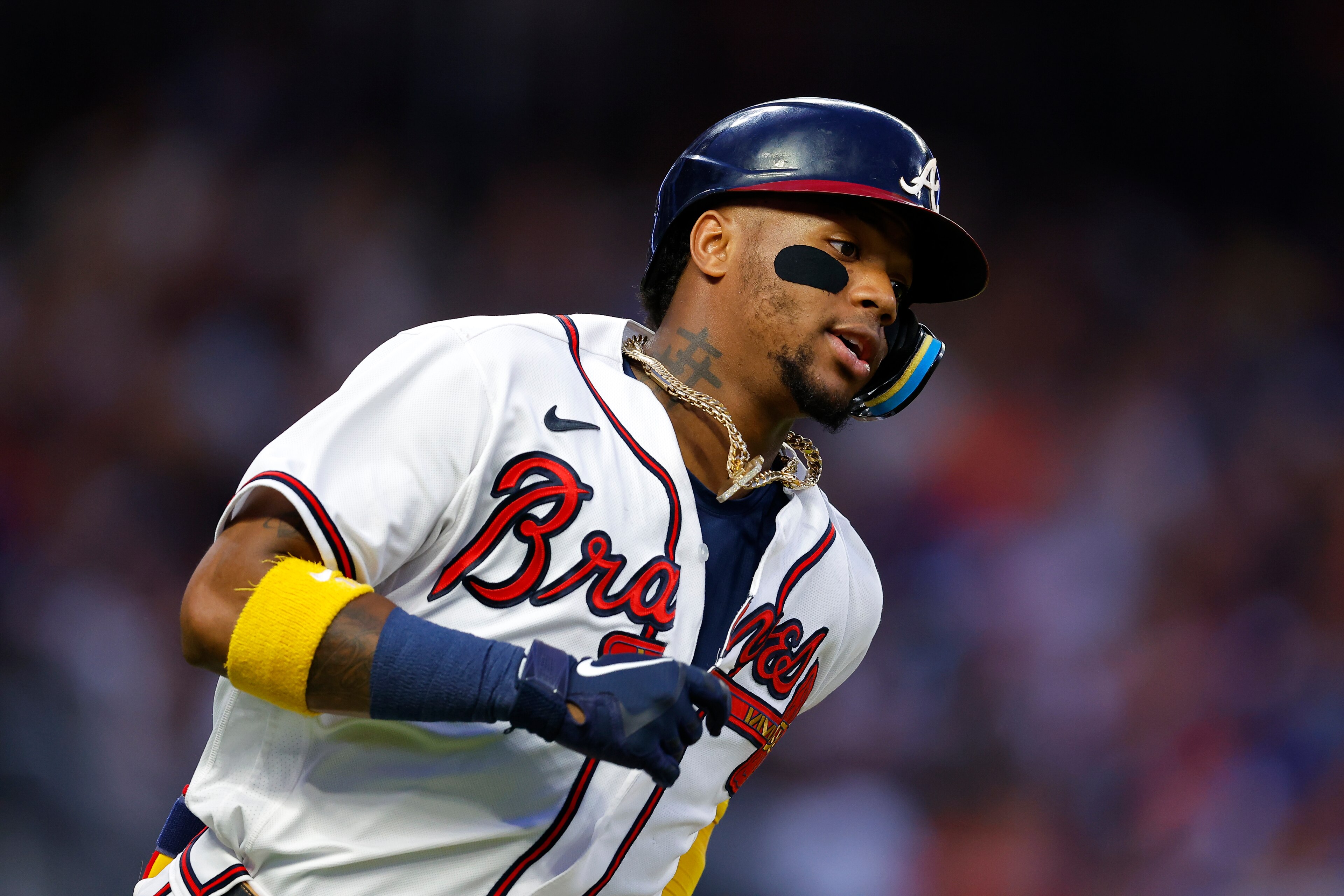 ATLANTA, GA - JUNE 25: Ronald Acuna Jr. #13 of the Atlanta Braves races to first for a single during the fifth inning against the Los Angeles Dodgers at Truist Park on June 25, 2022 in Atlanta, Georgia. (Photo by Todd Kirkland/Getty Images)