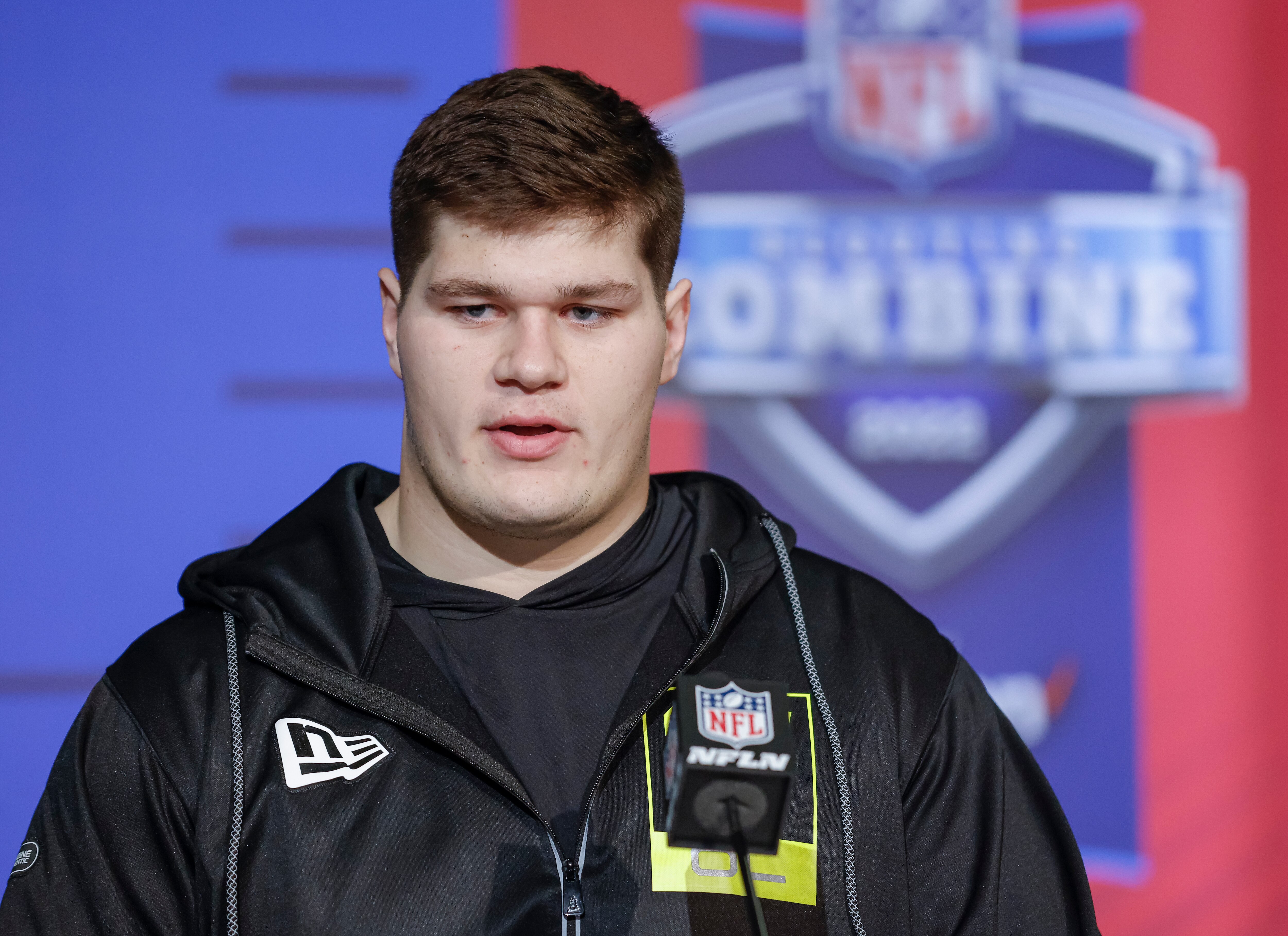 INDIANAPOLIS, IN - MAR 03: Tyler Linderbaum #OL27 of the Iowa Hawkeyes speaks to reporters during the NFL Draft Combine at the Indiana Convention Center on March 3, 2022 in Indianapolis, Indiana. (Photo by Michael Hickey/Getty Images)