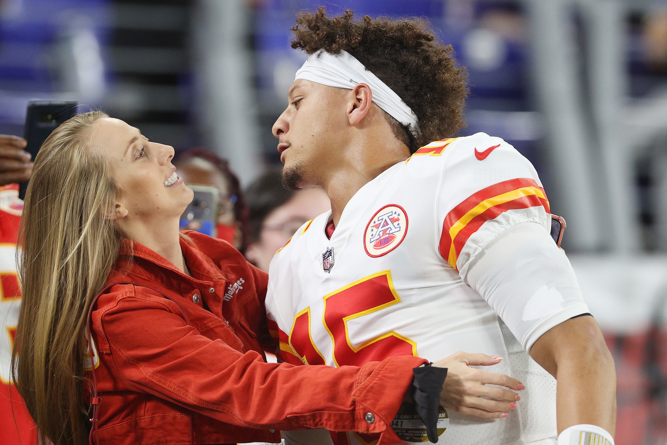 BALTIMORE, MARYLAND - SEPTEMBER 19: Patrick Mahomes #15 of the Kansas City Chiefs greets his fiance Brittany Matthews prior to the game against the Baltimore Ravens at M&T Bank Stadium on September 19, 2021 in Baltimore, Maryland. (Photo by Rob Carr/Getty Images)