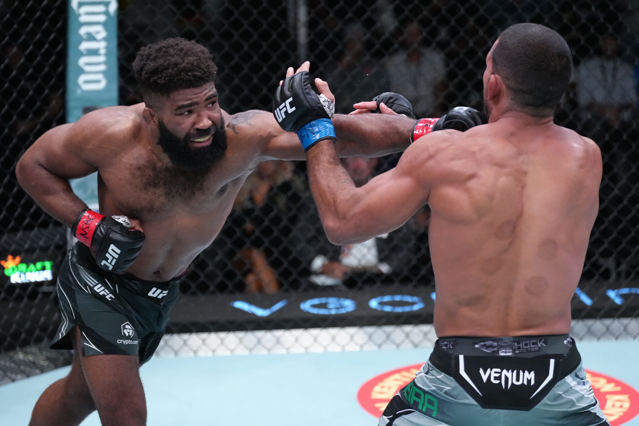 LAS VEGAS, NEVADA - JUNE 25: (L-R) Chris Curtis punches Rodolfo Vieira of Brazil in a middleweight fight during the UFC Fight Night event at UFC APEX on June 25, 2022 in Las Vegas, Nevada. (Photo by Jeff Bottari/Zuffa LLC)