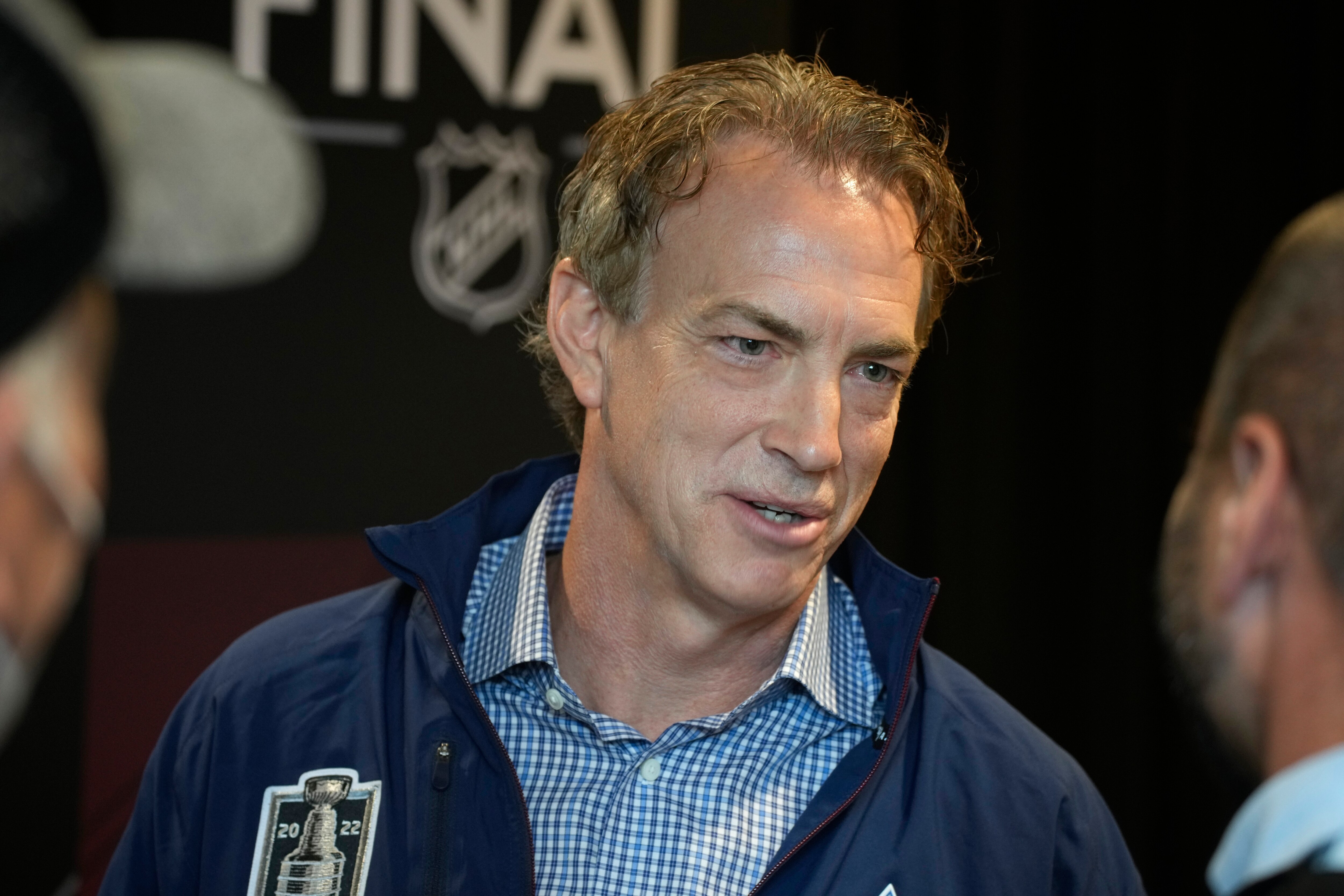 Colorado Avalanche general manager Joe Sakic talks to reporters during media day before Game 1 of the NHL hockey Stanley Cup Finals against the Tampa Bay Lightning Tuesday, June 14, 2022, in Denver. (AP Photo/David Zalubowski)