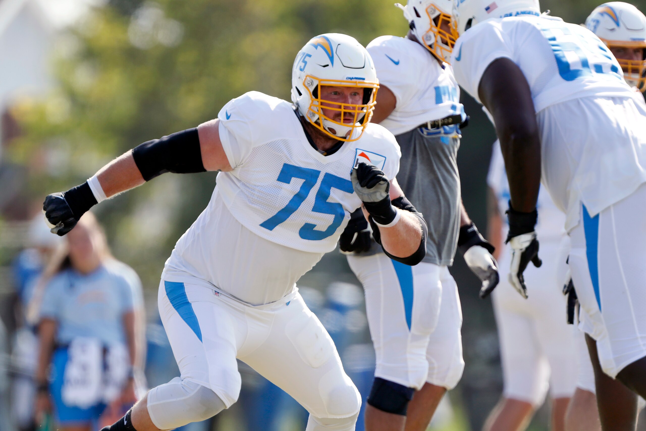 Los Angeles Chargers offensive tackle Bryan Bulaga works on a drill during NFL football practice in Costa Mesa, Calif., Thursday, Aug. 12, 2021. (AP Photo/Alex Gallardo)