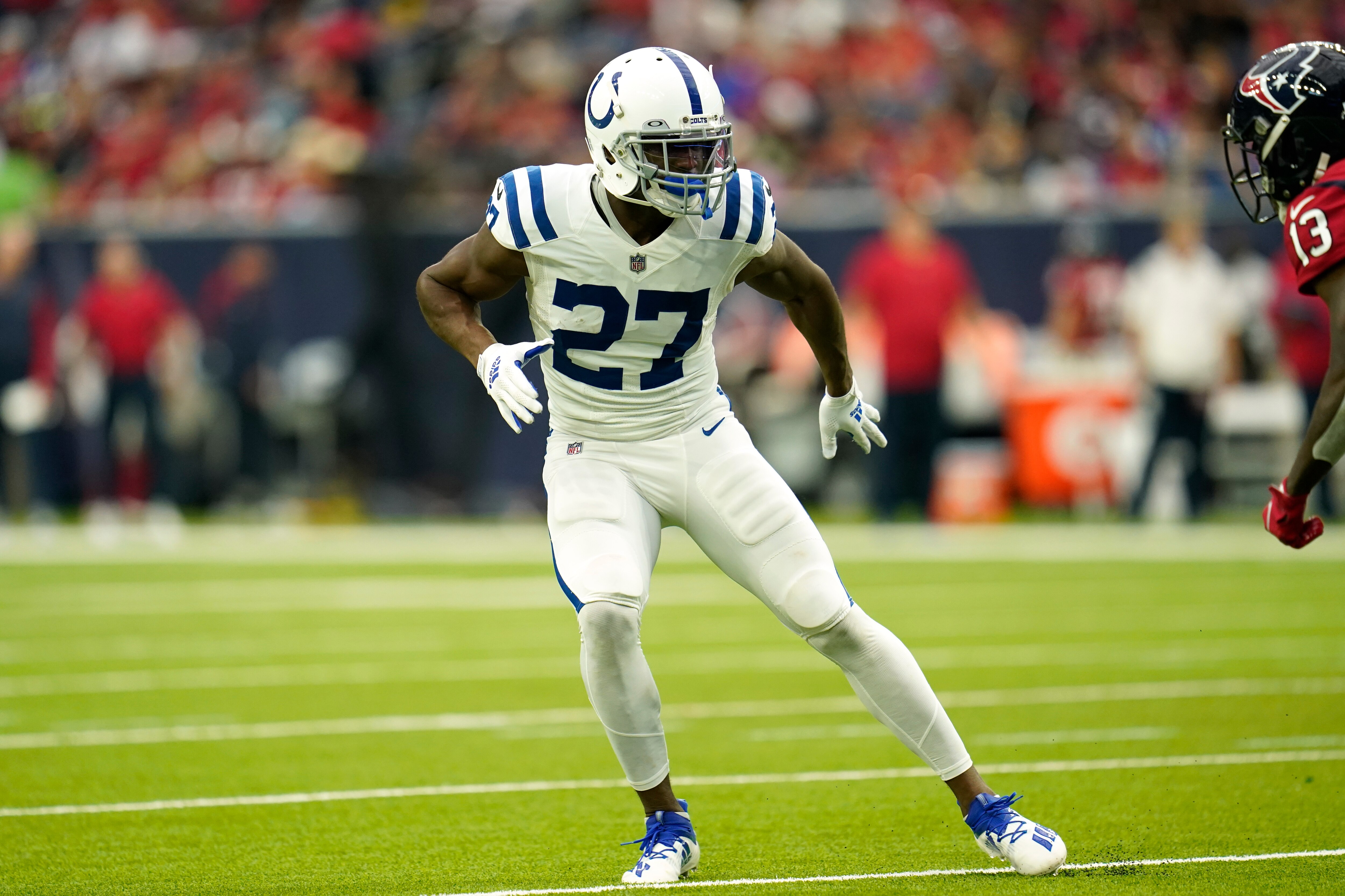 Indianapolis Colts defensive back Xavier Rhodes (27) drops in coverage during an NFL football game against the Houston Texans, Sunday, Dec. 5, 2021, in Houston. (AP Photo/Matt Patterson)