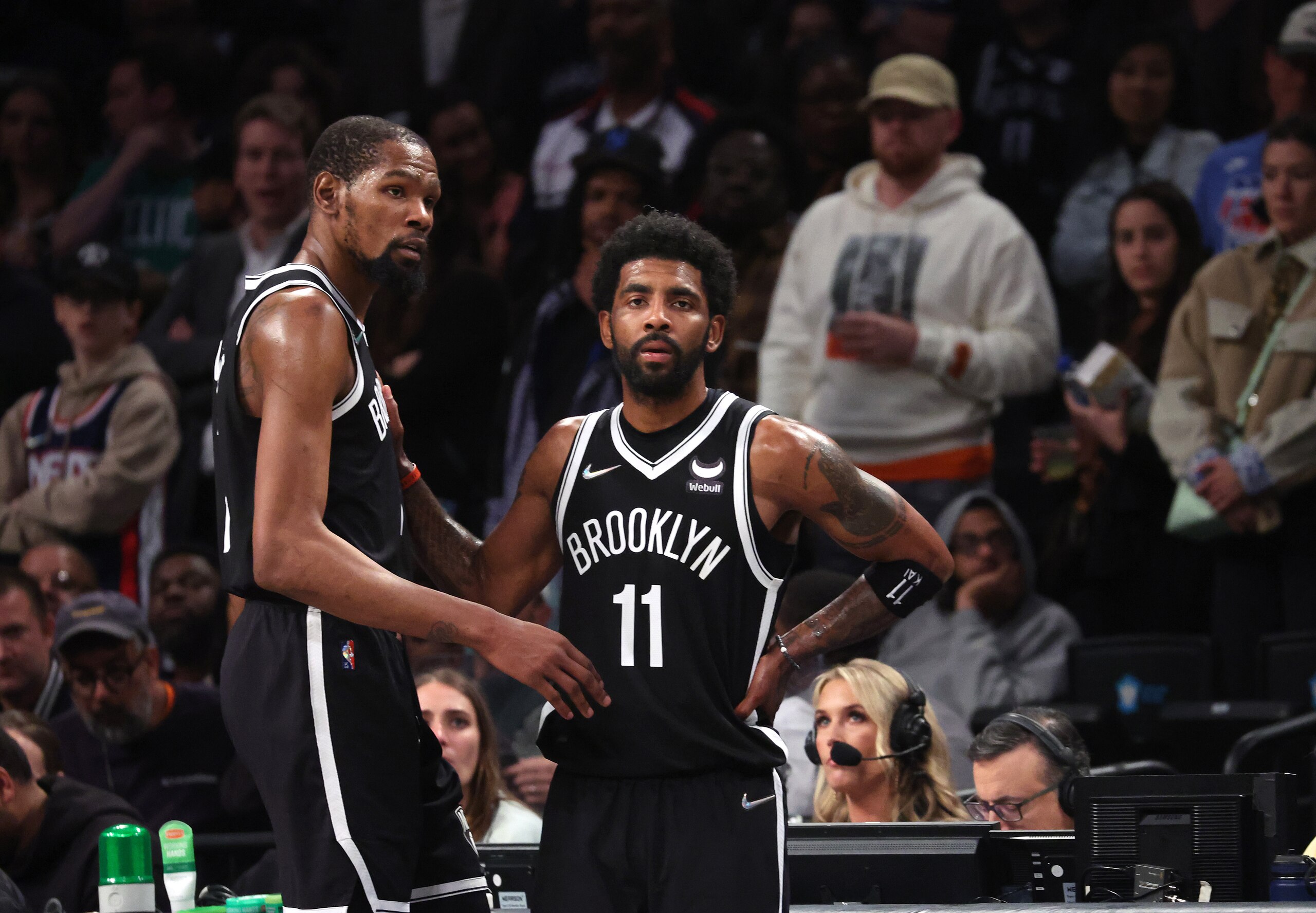 NEW YORK, NEW YORK - APRIL 23: Kevin Durant #7 and Kyrie Irving #11 of the Brooklyn Nets look on in the final seconds of their 109-103 loss against the Boston Celtics during Game Three of the Eastern Conference First Round NBA Playoffs at Barclays Center on April 23, 2022 in New York City. NOTE TO USER: User expressly acknowledges and agrees that, by downloading and or using this photograph, User is consenting to the terms and conditions of the Getty Images License Agreement. (Photo by Al Bello/Getty Images). NEW YORK, NEW YORK - APRIL 23: Kevin Durant #7 and Kyrie Irving #11 of the Brooklyn Nets look on in the final seconds of their 109-103 loss against the Boston Celtics during Game Three of the Eastern Conference First Round NBA Playoffs at Barclays Center on April 23, 2022 in New York City. NOTE TO USER: User expressly acknowledges and agrees that, by downloading and or using this photograph, User is consenting to the terms and conditions of the Getty Images License Agreement. (Photo by Al Bello/Getty Images).