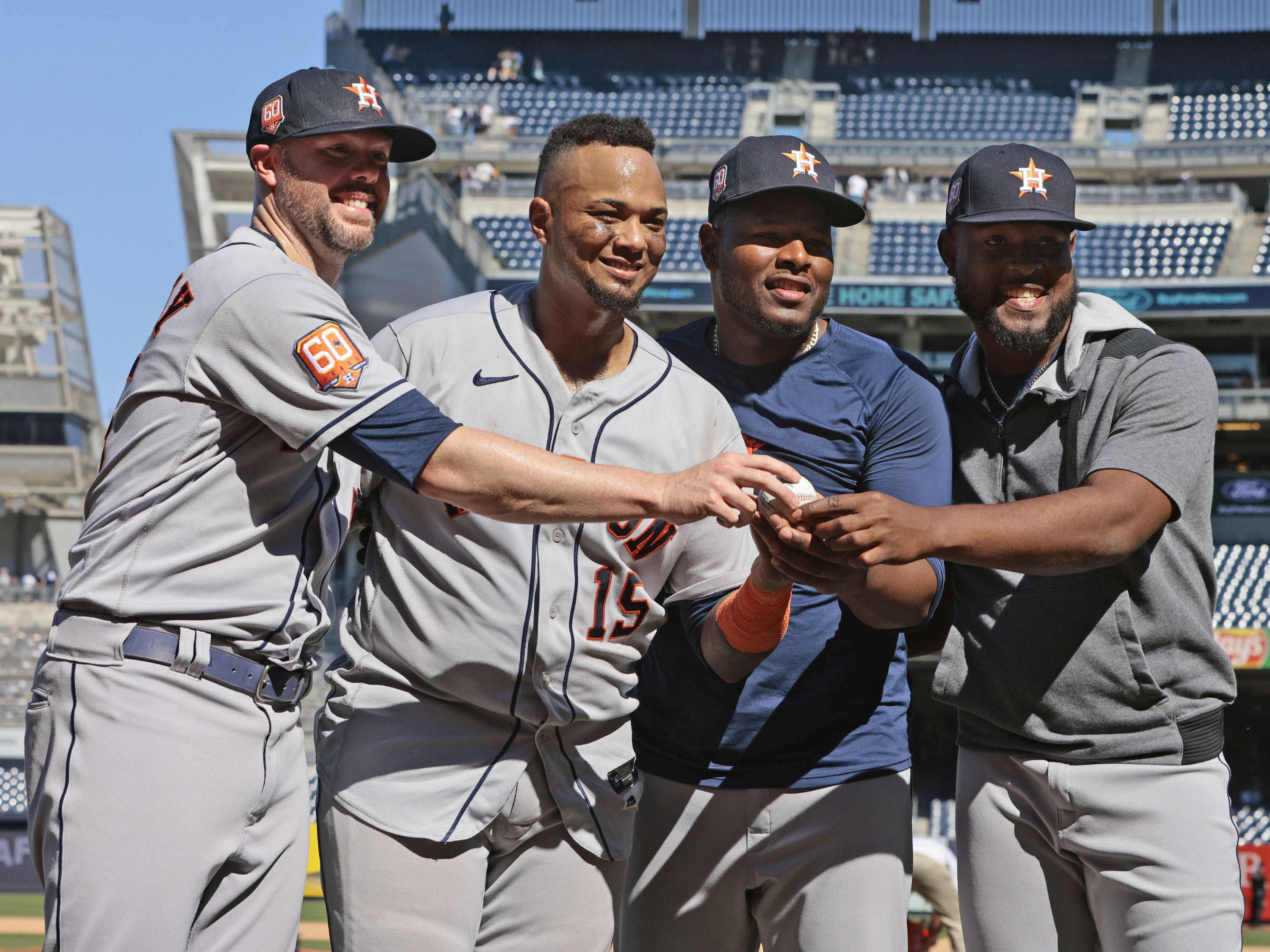 NEW YORK, NY - JUNE 25: Ryan Pressly #55, Martin Maldonado #15, Hector Neris #50 of the Houston Astros and Cristian Javier #53 of the Houston Astros pose for a photo after pitching a combined no hitter against the New York Yankees at Yankee Stadium on June 25, 2022 in the Bronx borough of New York City. The Astros defeated the Yankees 3-0. (Photo by Christopher Pasatieri/Getty Images)