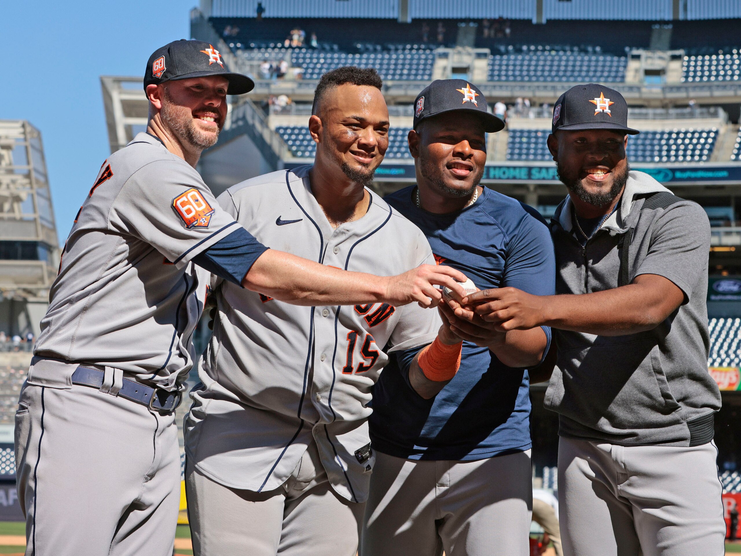 NEW YORK, NY - JUNE 25: Ryan Pressly #55, Martin Maldonado #15, Hector Neris #50 of the Houston Astros and Cristian Javier #53 of the Houston Astros pose for a photo after pitching a combined no hitter against the New York Yankees at Yankee Stadium on June 25, 2022 in the Bronx borough of New York City. The Astros defeated the Yankees 3-0. (Photo by Christopher Pasatieri/Getty Images)