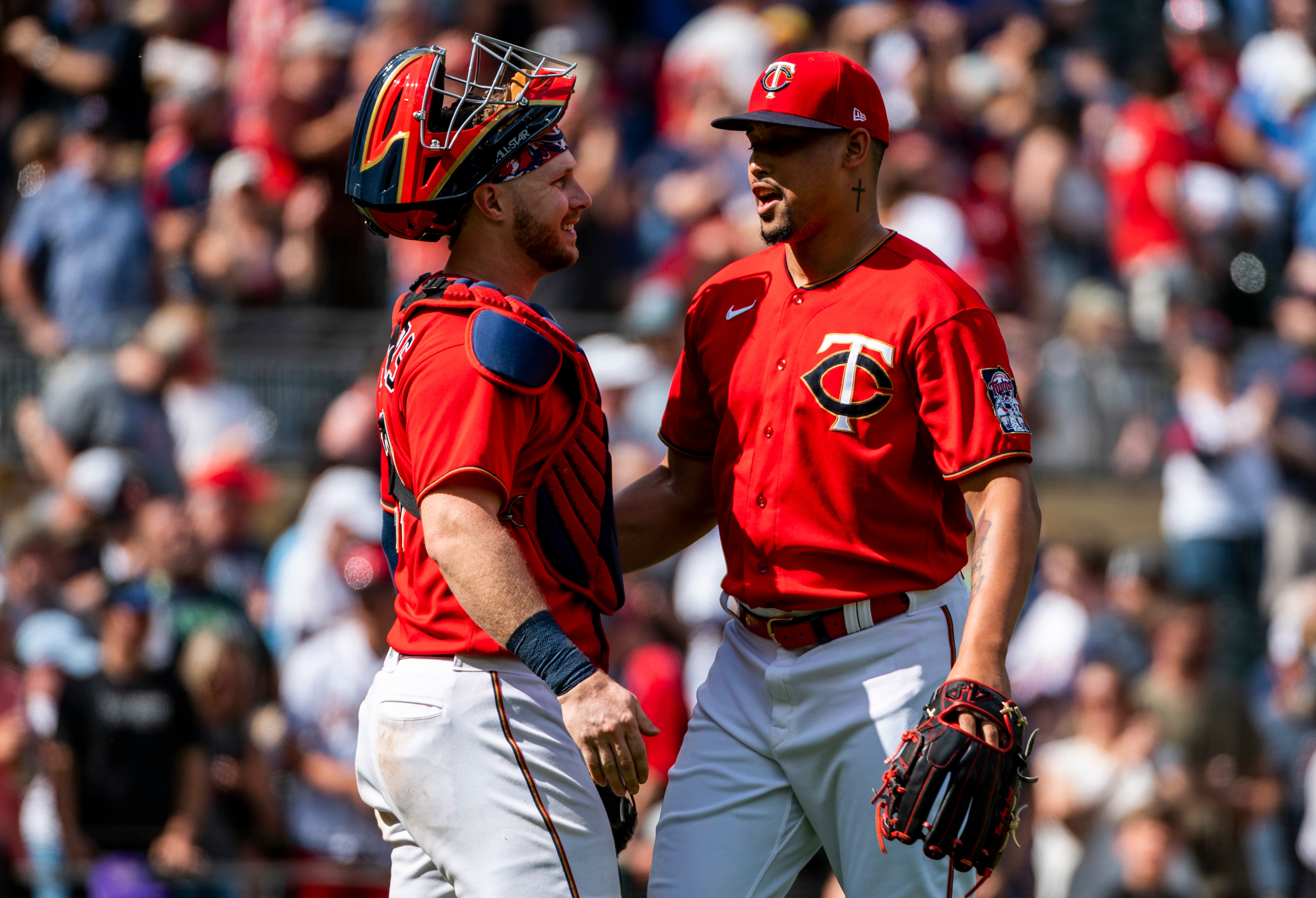 MINNEAPOLIS, MN - JUNE 26: Ryan Jeffers #27 and Jhoan Duran #59 of the Minnesota Twins greet each other after the game against the Colorado Rockies at Target Field on June 26, 2022 in Minneapolis, Minnesota. Duran earned the save in the Twins 6-3 victory over the Rockies. (Photo by Stephen Maturen/Getty Images)