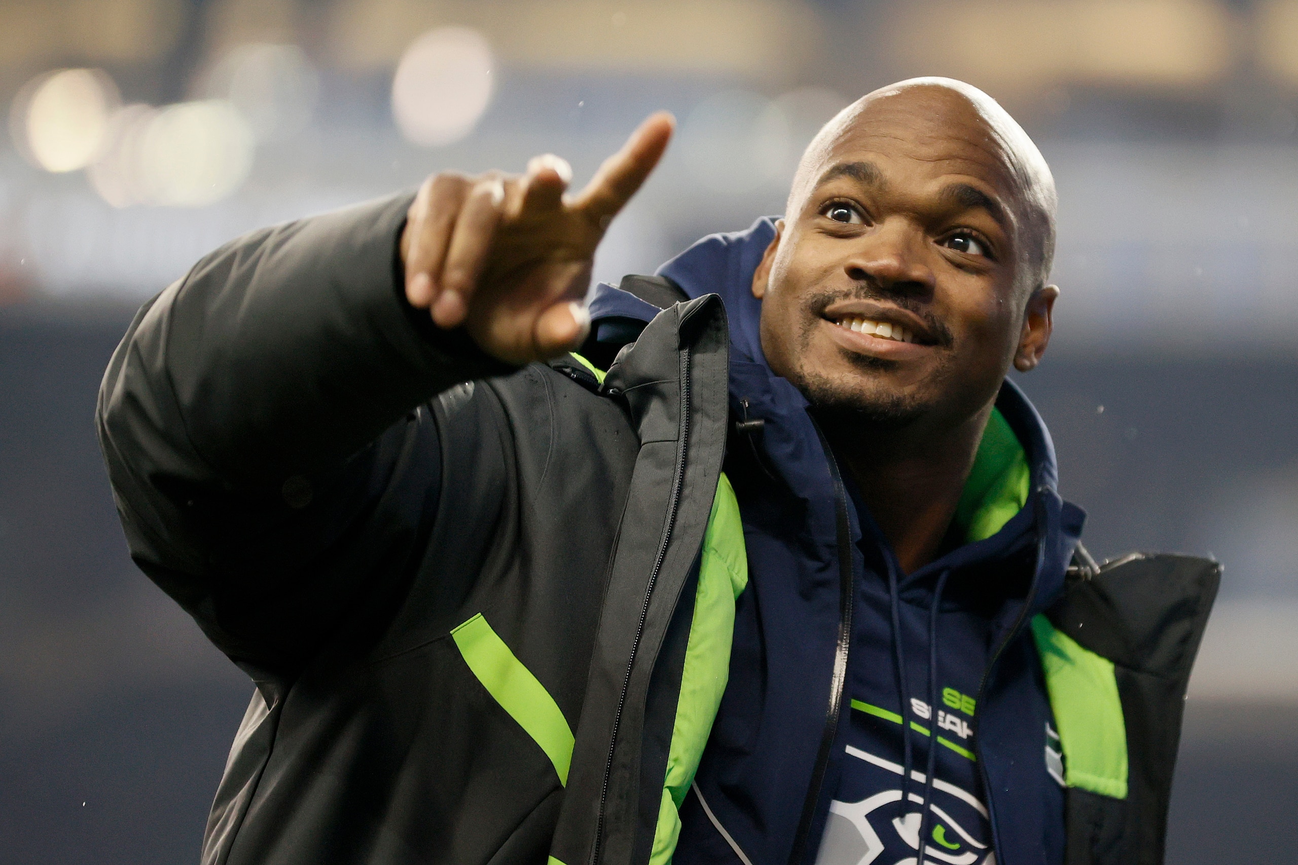 SEATTLE, WASHINGTON - JANUARY 02: Adrian Peterson #21 of the Seattle Seahawks reacts after defeating the Detroit Lions 51-29 at Lumen Field on January 02, 2022 in Seattle, Washington. (Photo by Steph Chambers/Getty Images)