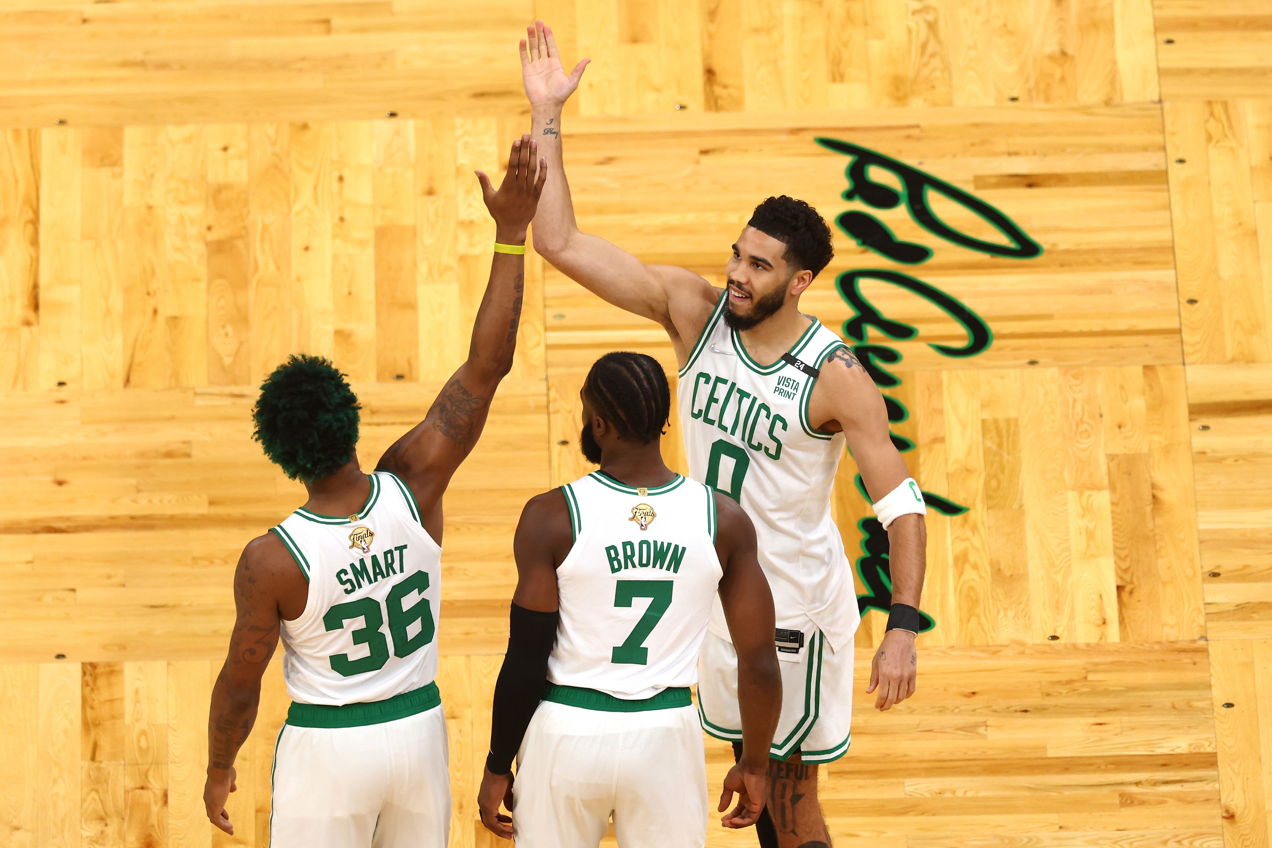 BOSTON, MASSACHUSETTS - JUNE 16: Marcus Smart #36, Jaylen Brown #7 and Jayson Tatum #0 of the Boston Celtics celebrate prior to Game Six of the 2022 NBA Finals against the Golden State Warriors at TD Garden on June 16, 2022 in Boston, Massachusetts. NOTE TO USER: User expressly acknowledges and agrees that, by downloading and/or using this photograph, User is consenting to the terms and conditions of the Getty Images License Agreement. (Photo by Adam Glanzman/Getty Images)