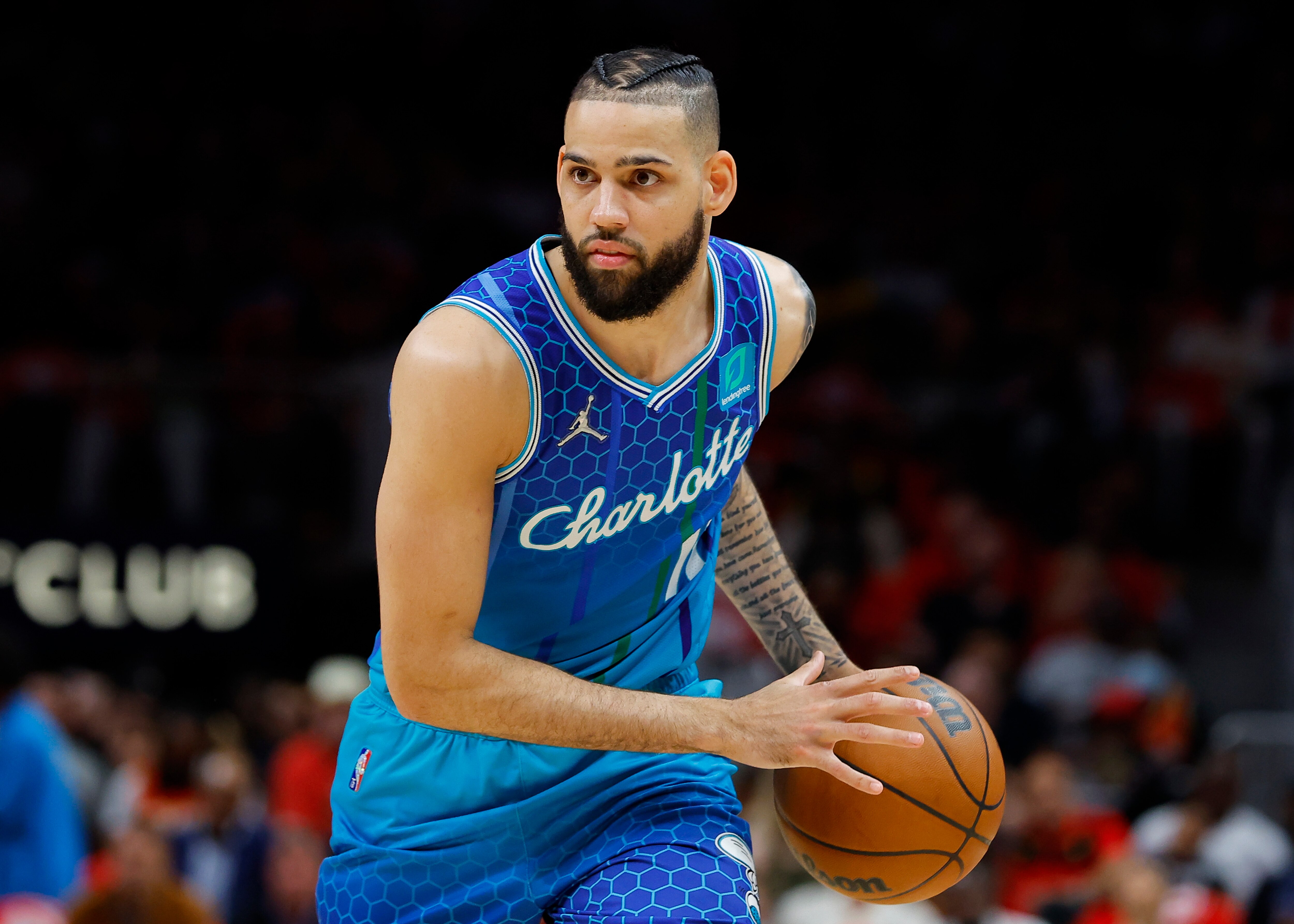 ATLANTA, GA - APRIL 13: Cody Martin #11 of the Charlotte Hornets drives to the basket during the first half against the Atlanta Hawks at State Farm Arena on April 13, 2022 in Atlanta, Georgia. NOTE TO USER: User expressly acknowledges and agrees that, by downloading and or using this photograph, User is consenting to the terms and conditions of the Getty Images License Agreement. (Photo by Todd Kirkland/Getty Images)