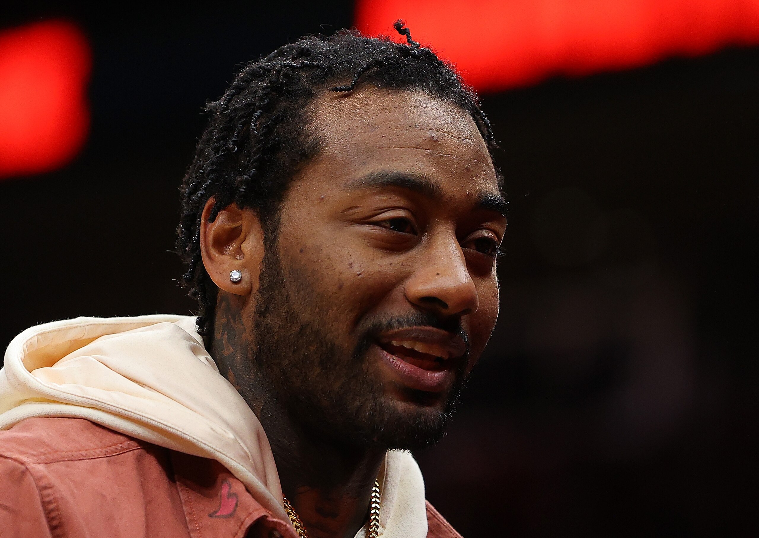 ATLANTA, GEORGIA - DECEMBER 13:  John Wall #1 of the Houston Rockets reacts prior to tip-off against the Atlanta Hawks at State Farm Arena on December 13, 2021 in Atlanta, Georgia.  NOTE TO USER: User expressly acknowledges and agrees that, by downloading and or using this photograph, User is consenting to the terms and conditions of the Getty Images License Agreement.  (Photo by Kevin C. Cox/Getty Images)