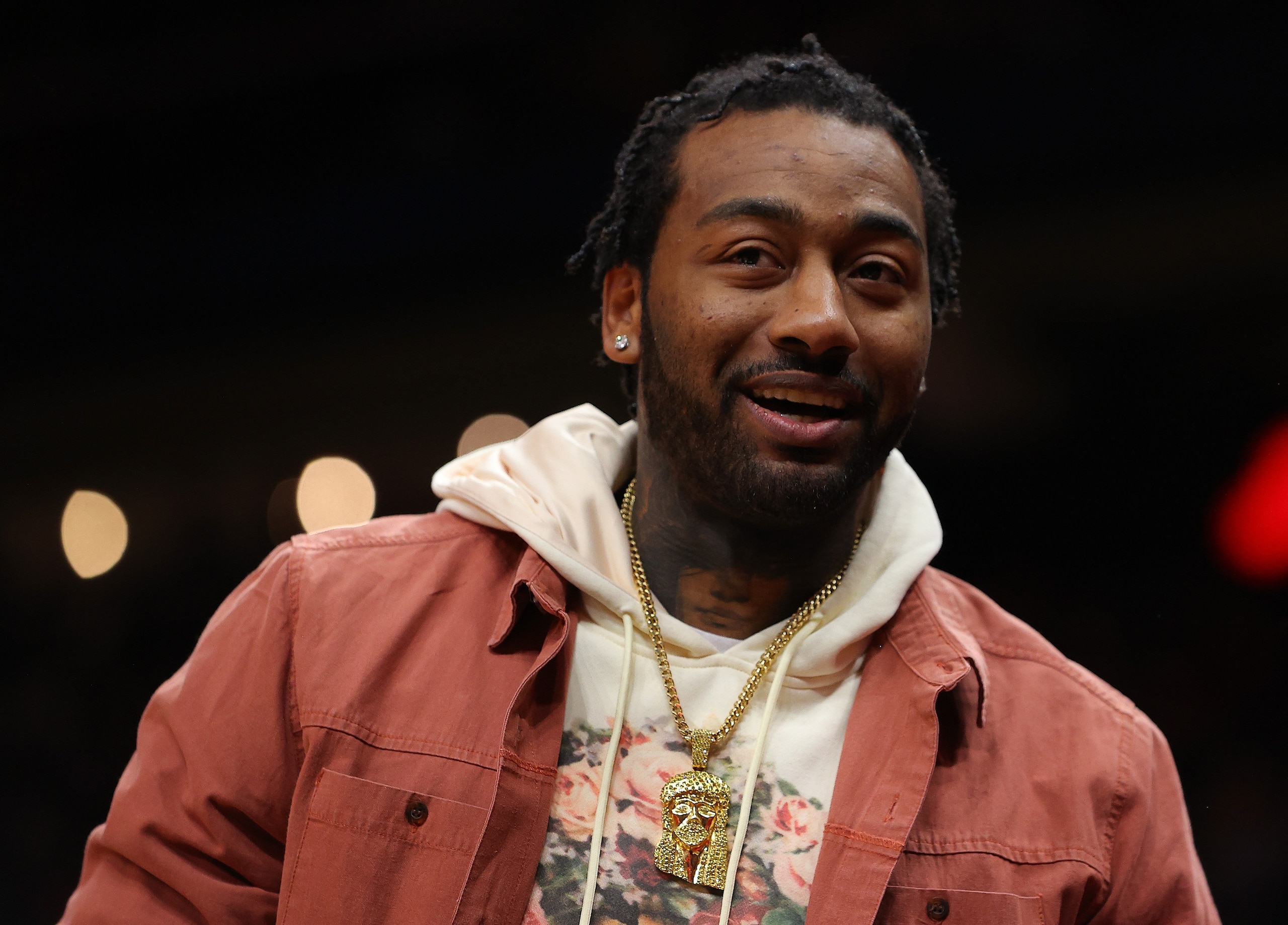 ATLANTA, GEORGIA - DECEMBER 13:  John Wall #1 of the Houston Rockets reacts prior to tip-off against the Atlanta Hawks at State Farm Arena on December 13, 2021 in Atlanta, Georgia.  NOTE TO USER: User expressly acknowledges and agrees that, by downloading and or using this photograph, User is consenting to the terms and conditions of the Getty Images License Agreement.  (Photo by Kevin C. Cox/Getty Images)