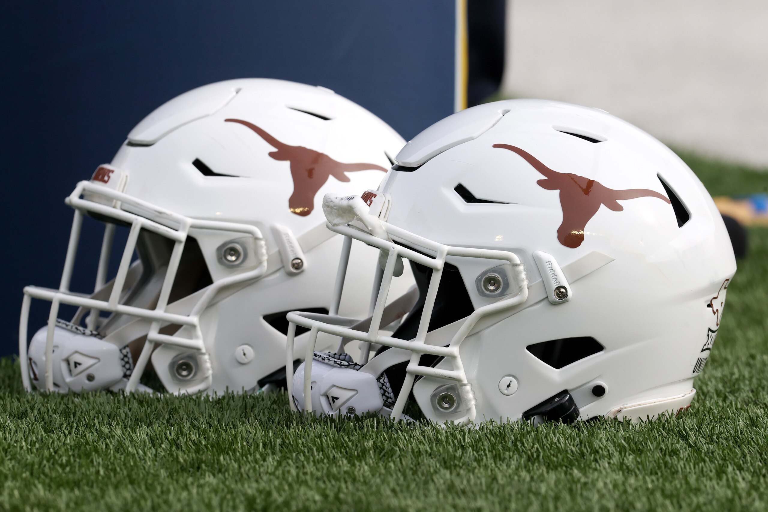 MORGANTOWN, WV - NOVEMBER 20: Texas Longhorns helmets on the sideline prior to the college football game between the Texas Longhorns and the West Virginia Mountaineers on November 20, 2021, at Mountaineer Field at Milan Puskar Stadium in Morgantown, WV. (Photo by Frank Jansky/Icon Sportswire via Getty Images) MORGANTOWN, WV - NOVEMBER 20: Texas Longhorns helmets on the sideline prior to the college football game between the Texas Longhorns and the West Virginia Mountaineers on November 20, 2021, at Mountaineer Field at Milan Puskar Stadium in Morgantown, WV. (Photo by Frank Jansky/Icon Sportswire via Getty Images)