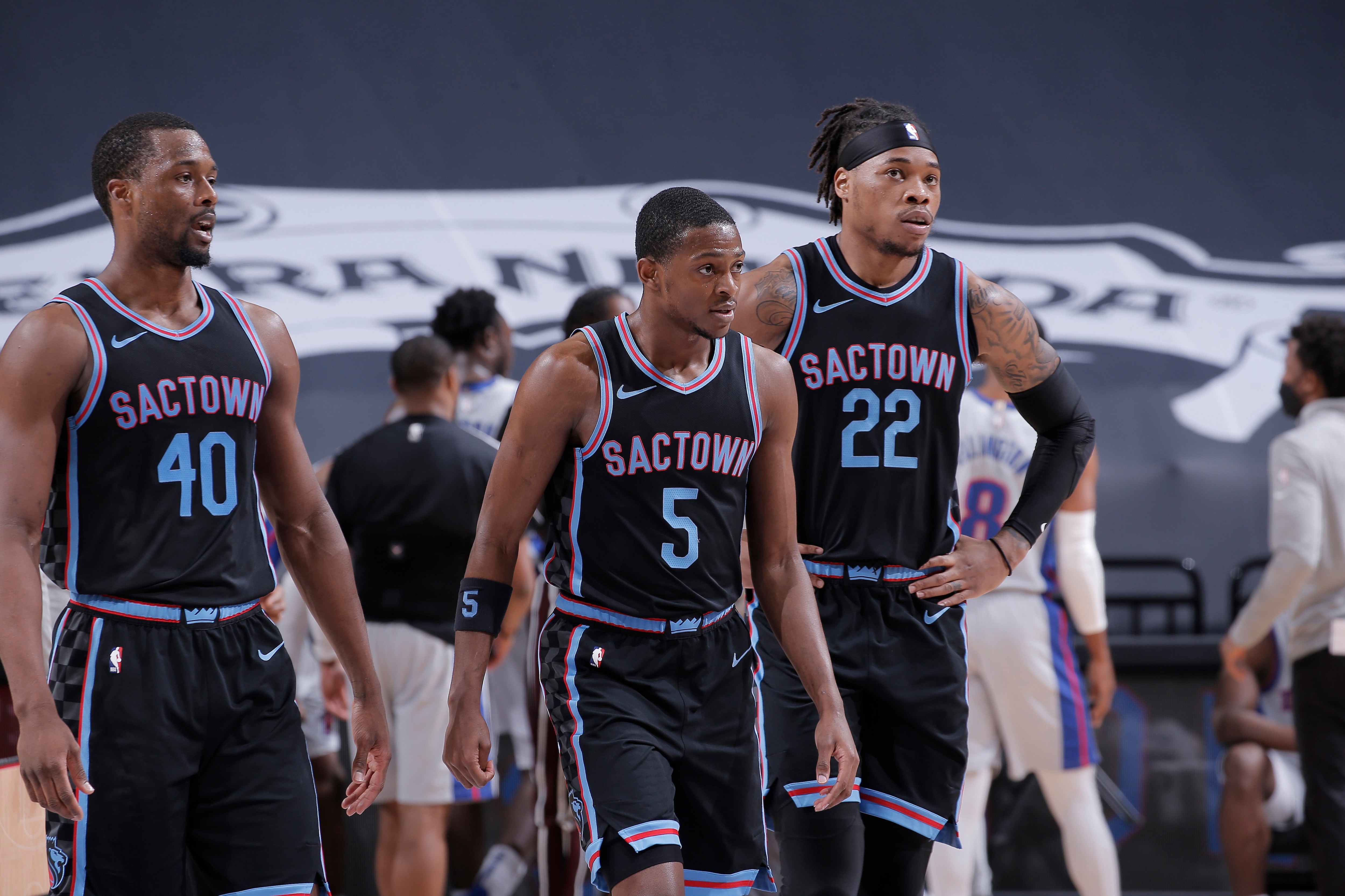 SACRAMENTO, CA - APRIL 8: Harrison Barnes #40, De'Aaron Fox #5 and Richaun Holmes #22 of the Sacramento Kings face the Detroit Pistons on April 8, 2021 at Golden 1 Center in Sacramento, California. NOTE TO USER: User expressly acknowledges and agrees that, by downloading and or using this photograph, User is consenting to the terms and conditions of the Getty Images Agreement. Mandatory Copyright Notice: Copyright 2021 NBAE (Photo by Rocky Widner/NBAE via Getty Images)