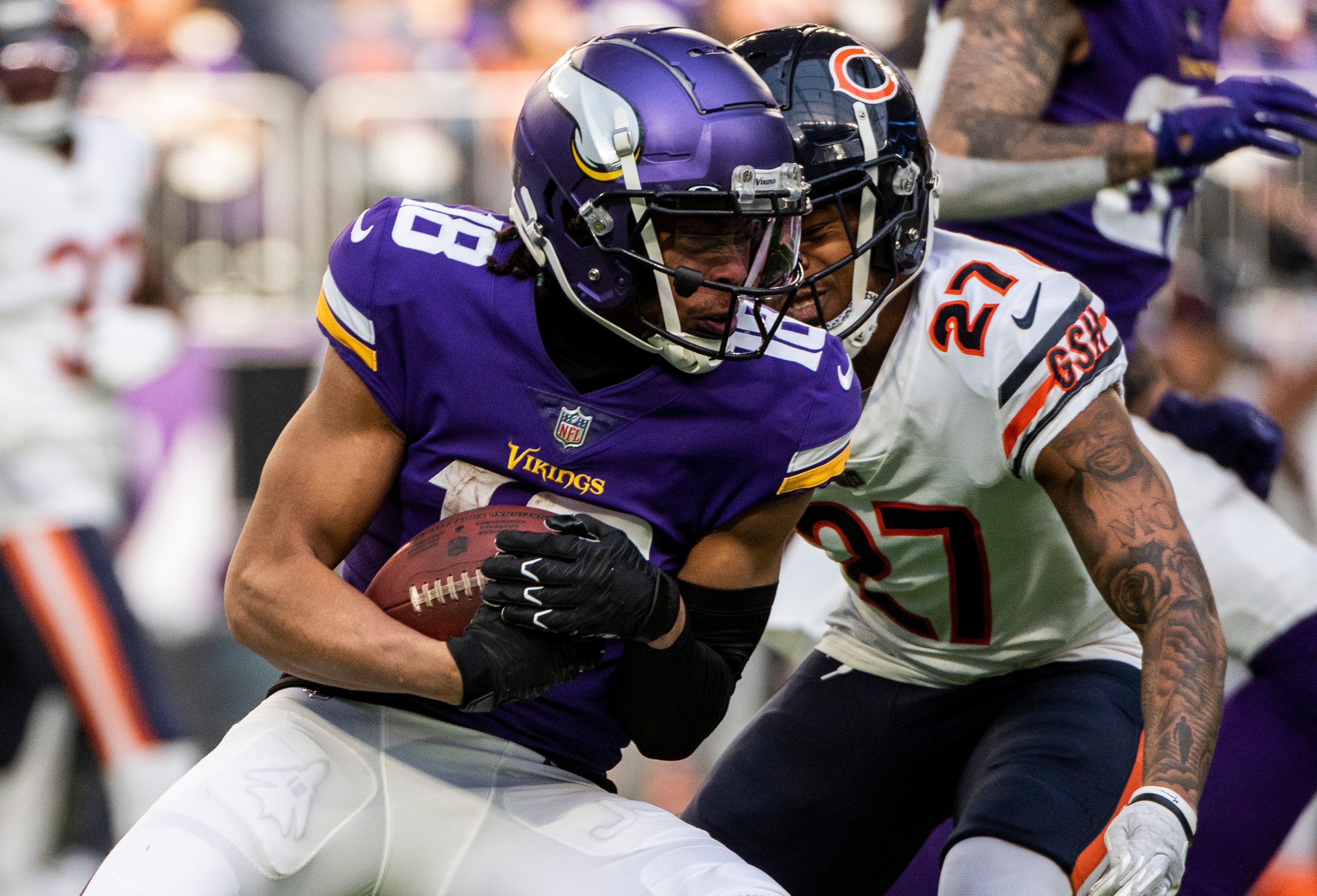 MINNEAPOLIS, MN - JANUARY 09: Justin Jefferson #18 of the Minnesota Vikings catches the ball in the third quarter of the game against the Chicago Bears at U.S. Bank Stadium on January 9, 2022 in Minneapolis, Minnesota. (Photo by Stephen Maturen/Getty Images)