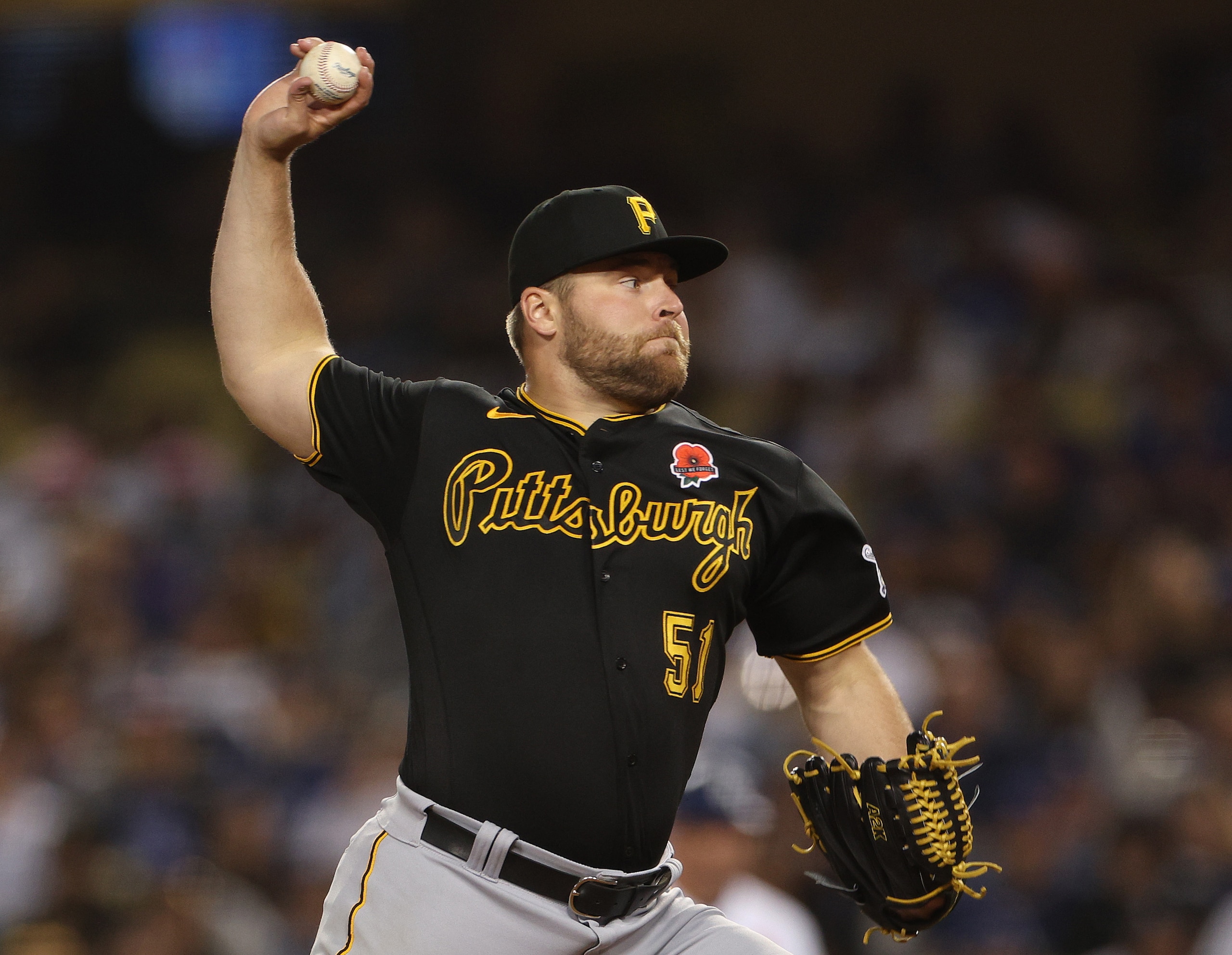 LOS ANGELES, CALIFORNIA - MAY 30: David Bednar #51 of the Pittsburgh Pirates pitches during the ninth inning against the Los Angeles Dodgers at Dodger Stadium on May 30, 2022 in Los Angeles, California. (Photo by Harry How/Getty Images)