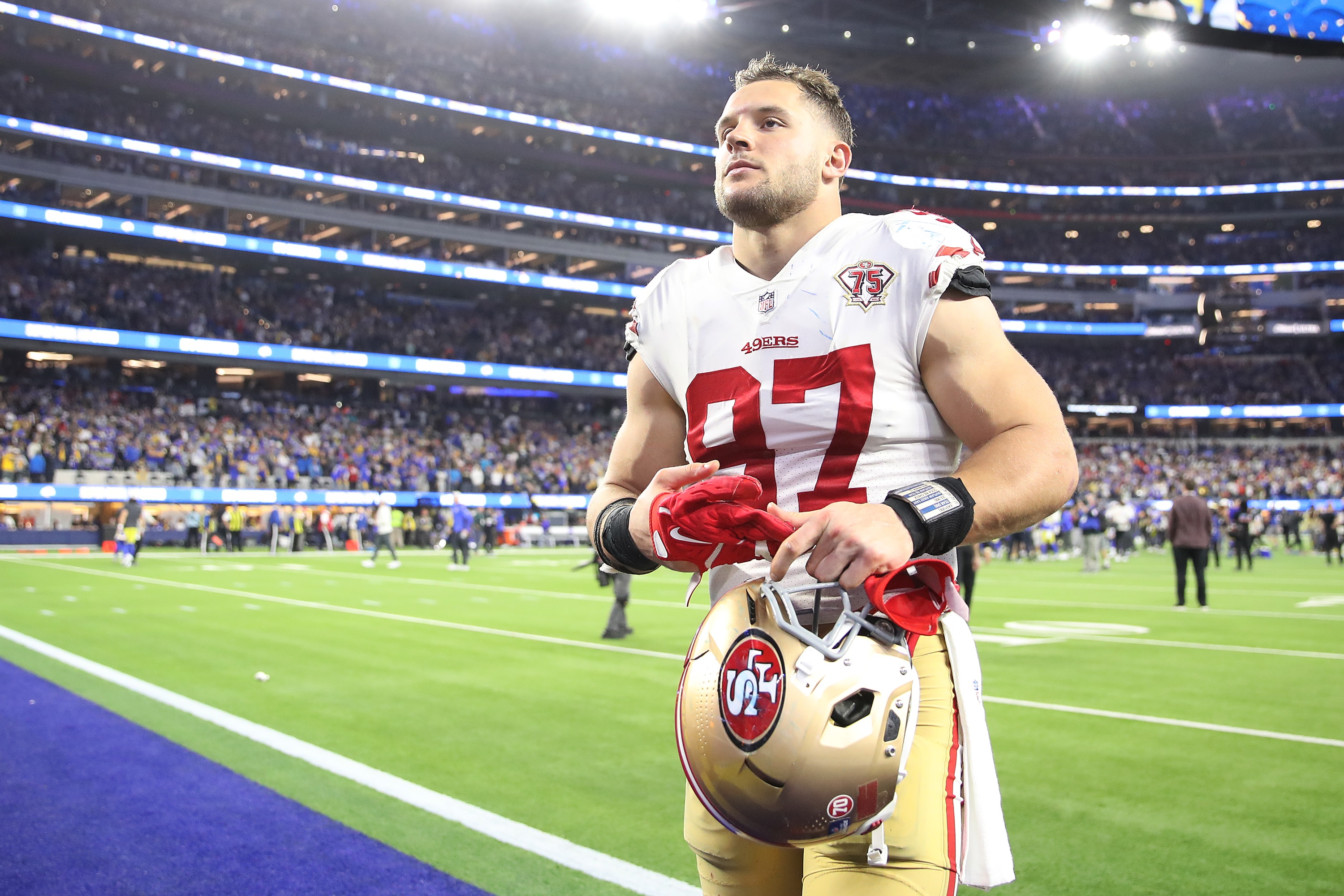 INGLEWOOD, CALIFORNIA - JANUARY 30: Nick Bosa #97 of the San Francisco 49ers walks off the field after being defeated by the Los Angeles Rams in the NFC Championship Game at SoFi Stadium on January 30, 2022 in Inglewood, California. The Rams defeated the 49ers 20-17. (Photo by Christian Petersen/Getty Images)