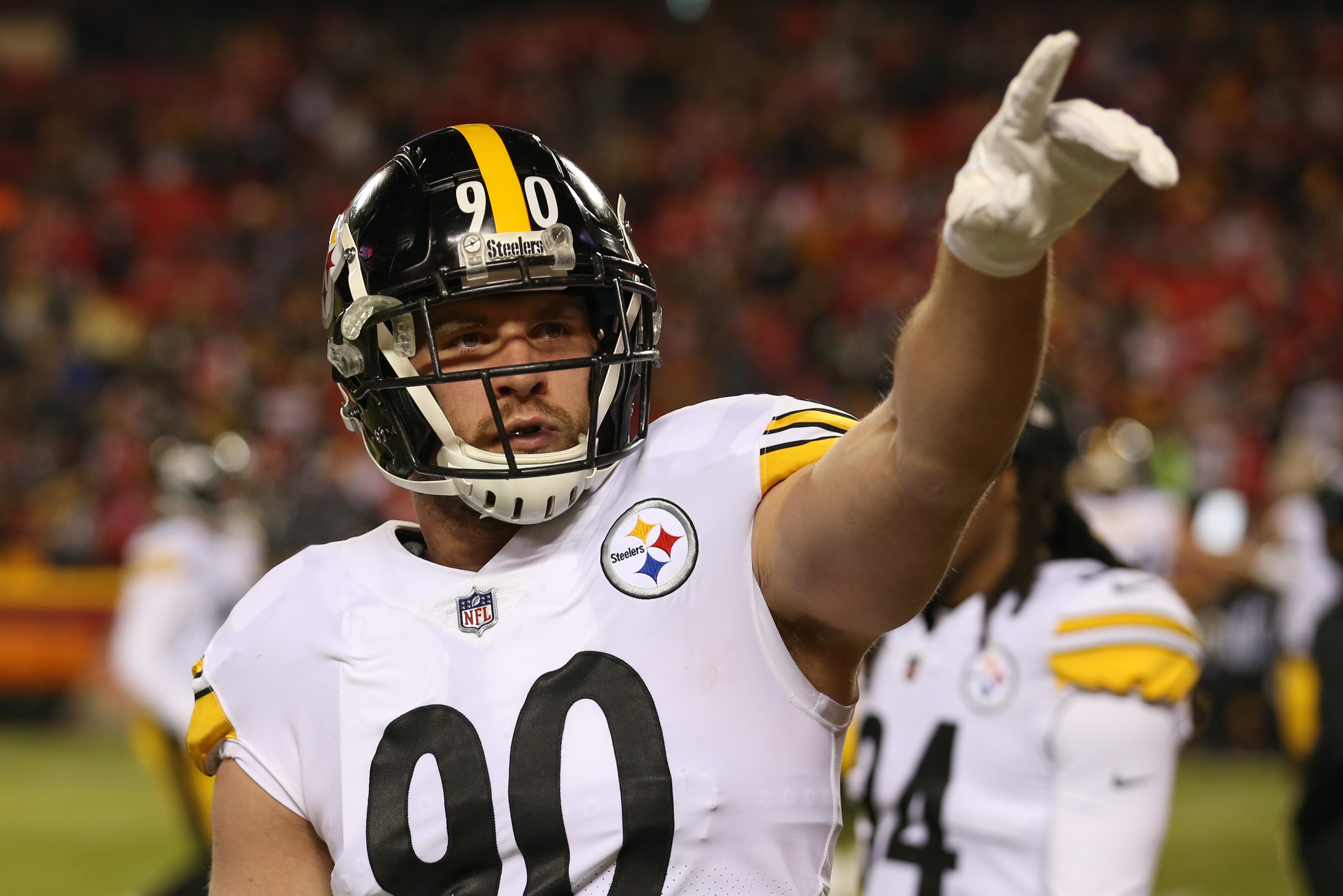 KANSAS CITY, MO - JANUARY 16: Pittsburgh Steelers outside linebacker T.J. Watt (90) points to fans before an AFC wild card playoff game between the Pittsburgh Steelers and Kansas City Chiefs on Jan 16, 2022 at GEHA Field at Arrowhead Stadium in Kansas City, MO. (Photo by Scott Winters/Icon Sportswire via Getty Images)