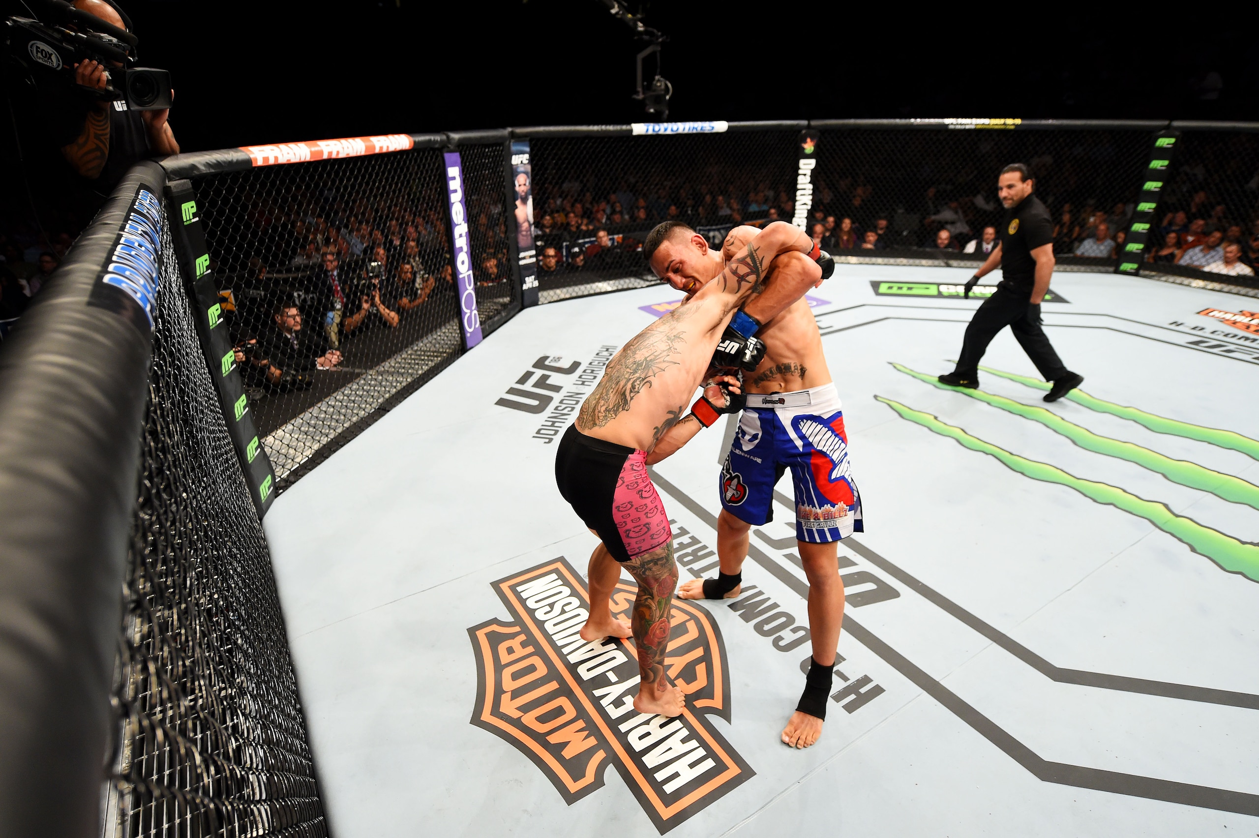 NEWARK, NJ - APRIL 18:  Cub Swanson and Max Holloway grapple in their featherweight bout during the UFC Fight Night event at Prudential Center on April 18, 2015 in Newark, New Jersey.  (Photo by Josh Hedges/Zuffa LLC/Zuffa LLC via Getty Images)