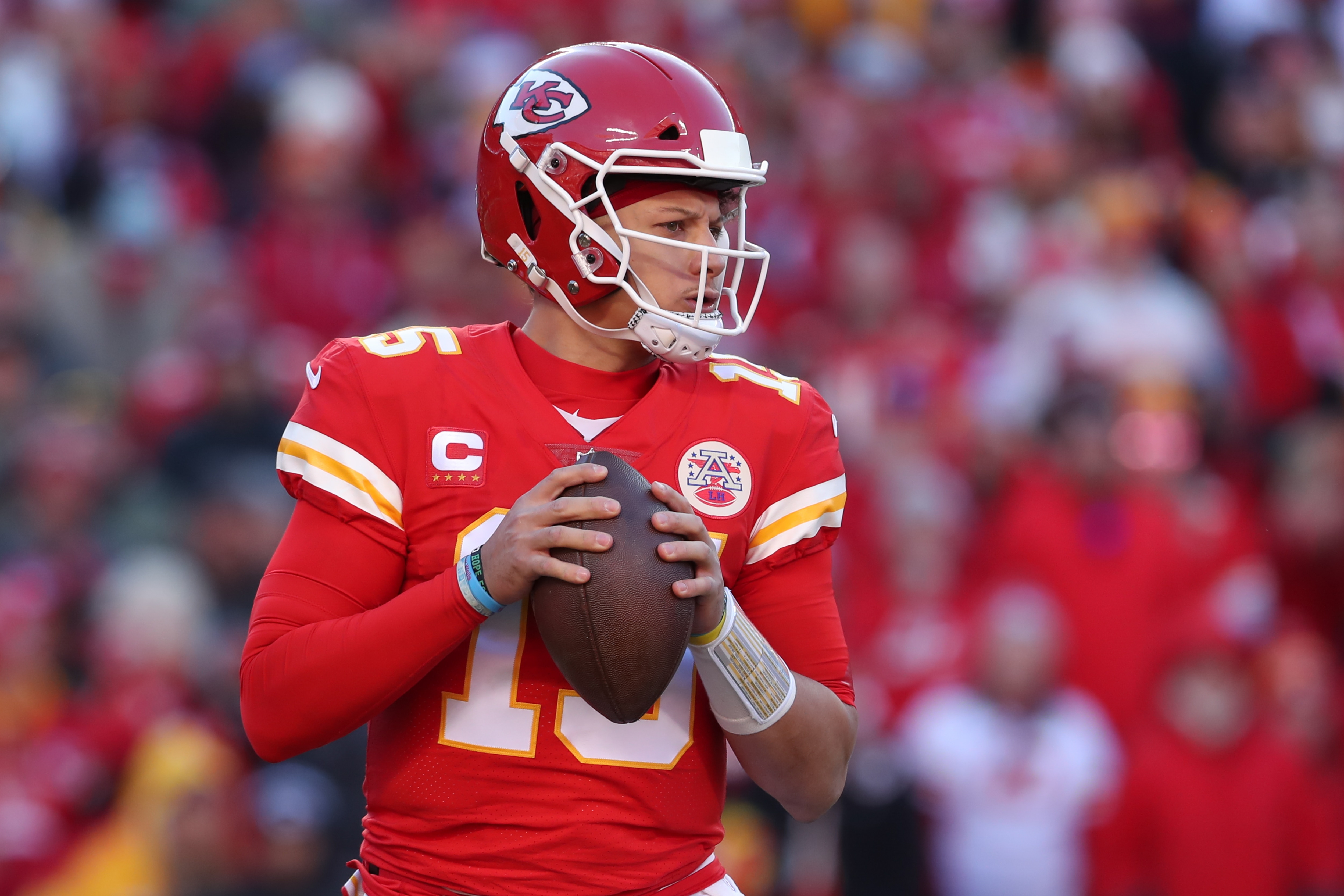KANSAS CITY, MO - JANUARY 30: Kansas City Chiefs quarterback Patrick Mahomes (15) looks to pass in the second quarter of the AFC Championship game between the Cincinnati Bengals and Kansas City Chiefs on Jan 30, 2022 at GEHA Field at Arrowhead Stadium in Kansas City, MO. (Photo by Scott Winters/Icon Sportswire via Getty Images)