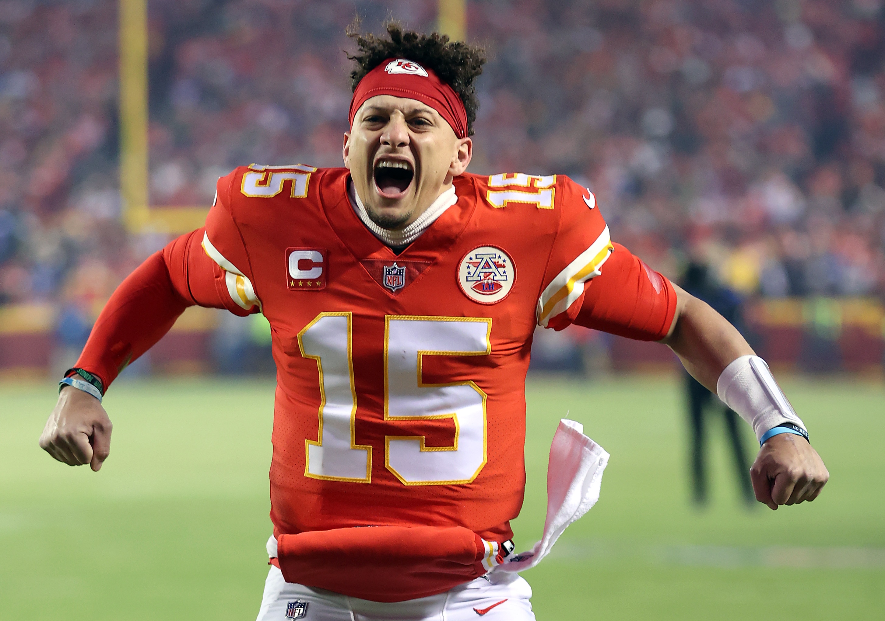 KANSAS CITY, MISSOURI - JANUARY 23:  Patrick Mahomes #15 of the Kansas City Chiefs pumps up the crowd prior to the AFC Divisional Playoff game against the Buffalo Bills at Arrowhead Stadium on January 23, 2022 in Kansas City, Missouri. (Photo by Jamie Squire/Getty Images)