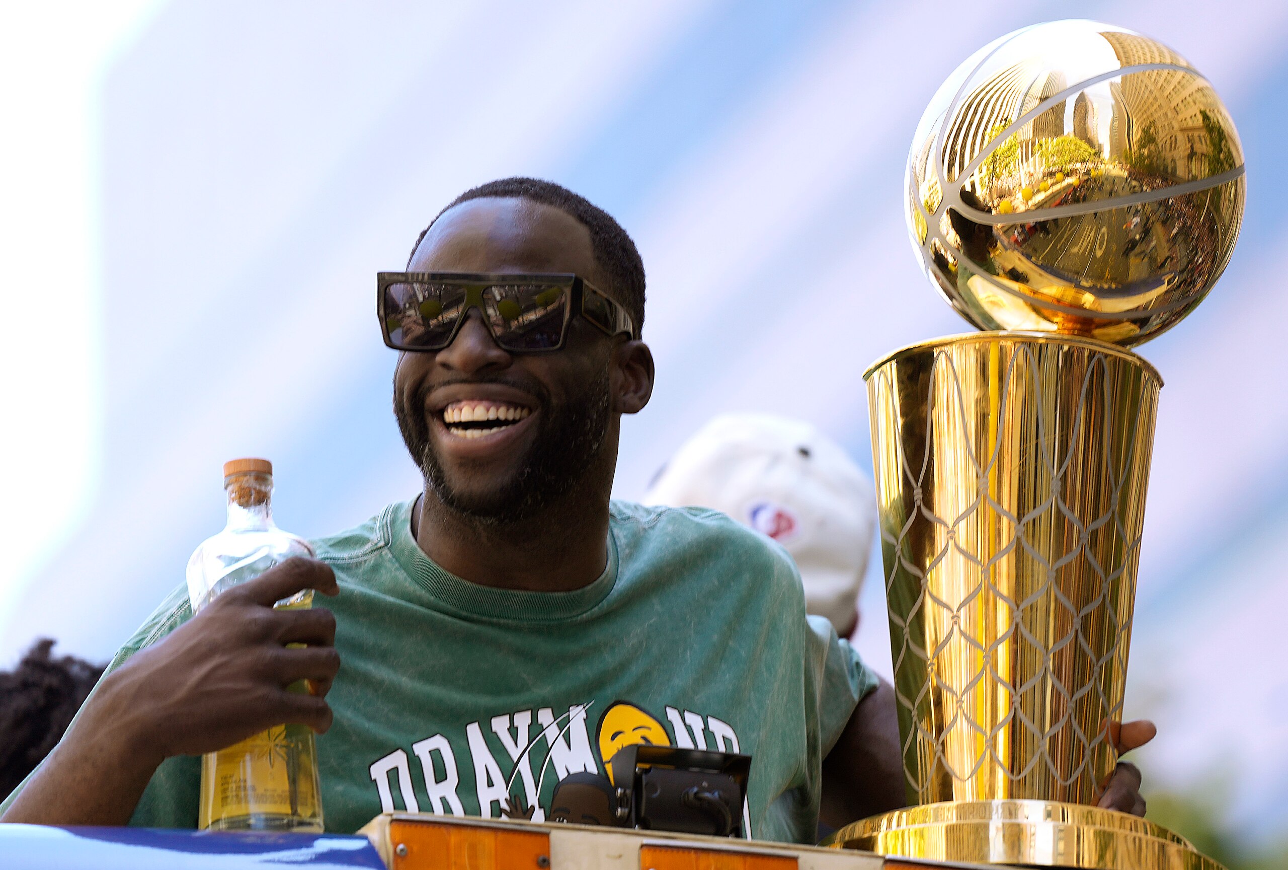 SAN FRANCISCO, CALIFORNIA - JUNE 20: Draymond Green #23 of the Golden State Warriors celebrates with the NBA Championship Trophy during the Golden State Warriors Victory Parade on June 20, 2022 in San Francisco, California. The Golden State Warriors beat the Boston Celtics 4-2 to win the 2022 NBA Finals. NOTE TO USER: User expressly acknowledges and agrees that, by downloading and or using this photograph, User is consenting to the terms and conditions of the Getty Images License Agreement. (Photo by Thearon W. Henderson/Getty Images)(Photo by Thearon W. Henderson/Getty Images)