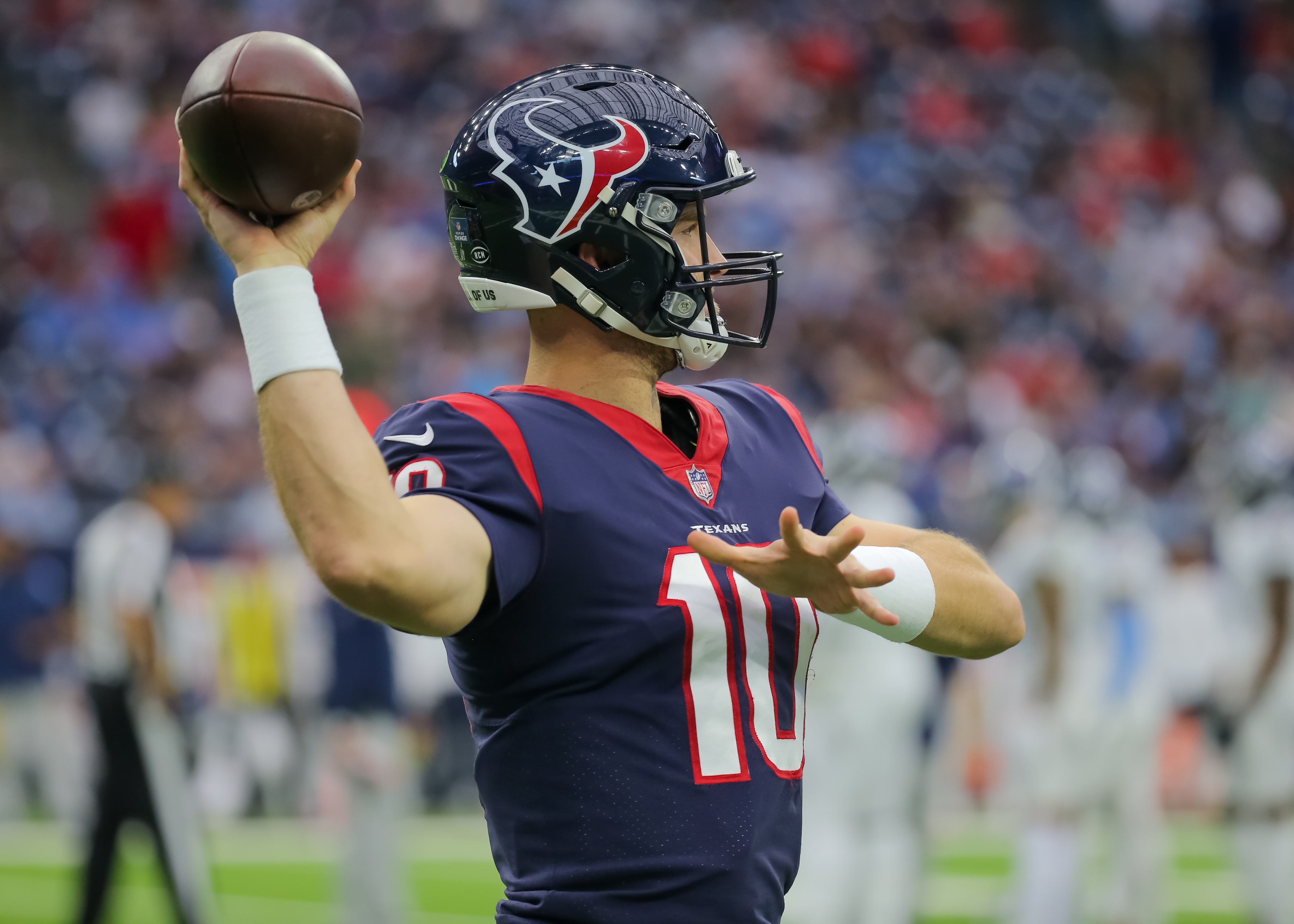HOUSTON, TX - JANUARY 09:  Houston Texans quarterback Davis Mills (10) warms up between plays during the NFL game between the Tennessee Titans and Houston Texans on January 9, 2022 at NRG Stadium in Houston, Texas.  (Photo by Leslie Plaza Johnson/Icon Sportswire via Getty Images)