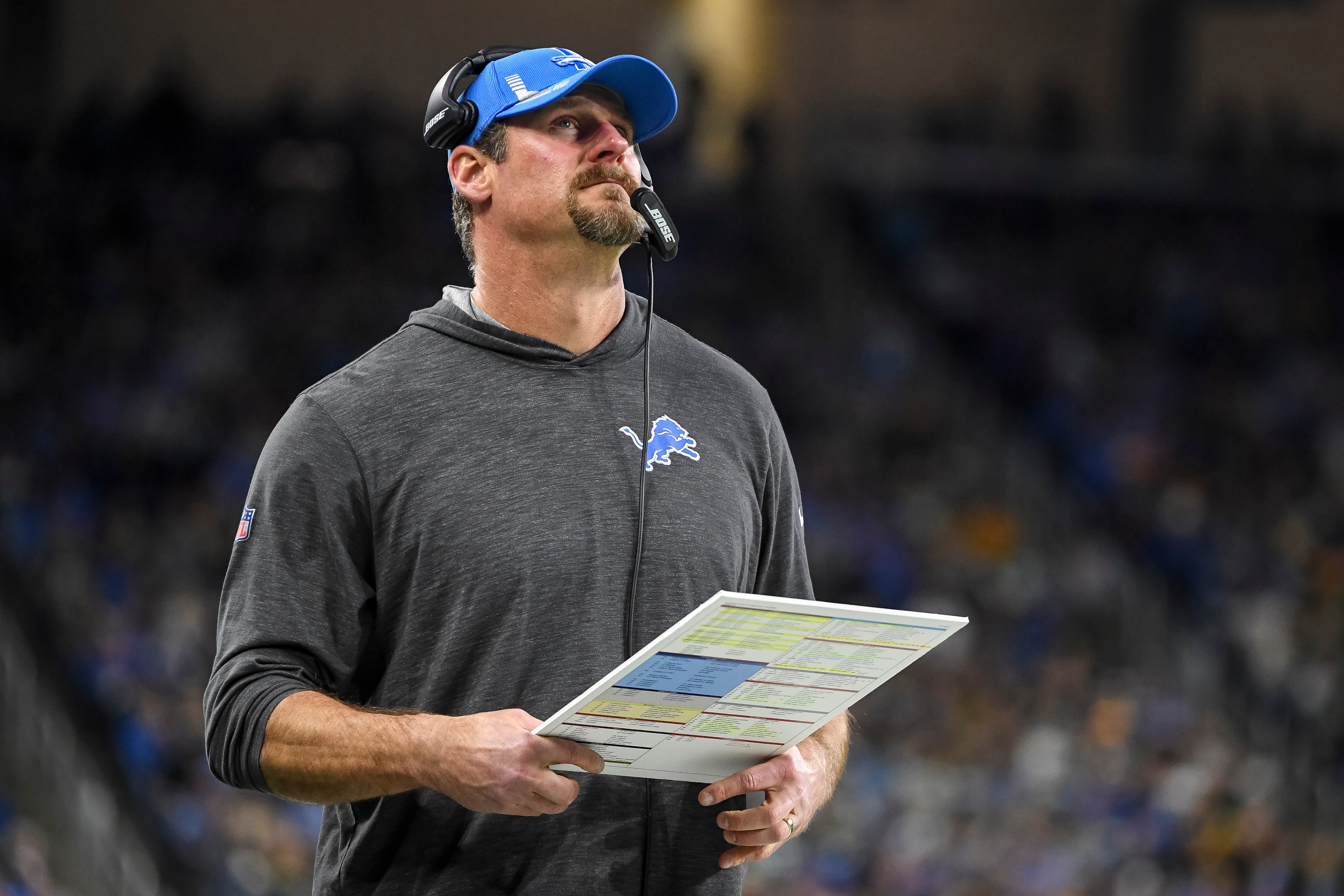 DETROIT, MICHIGAN - JANUARY 09: Head coach Dan Campbell of the Detroit Lions looks on against the Green Bay Packers at Ford Field on January 09, 2022 in Detroit, Michigan. (Photo by Nic Antaya/Getty Images)