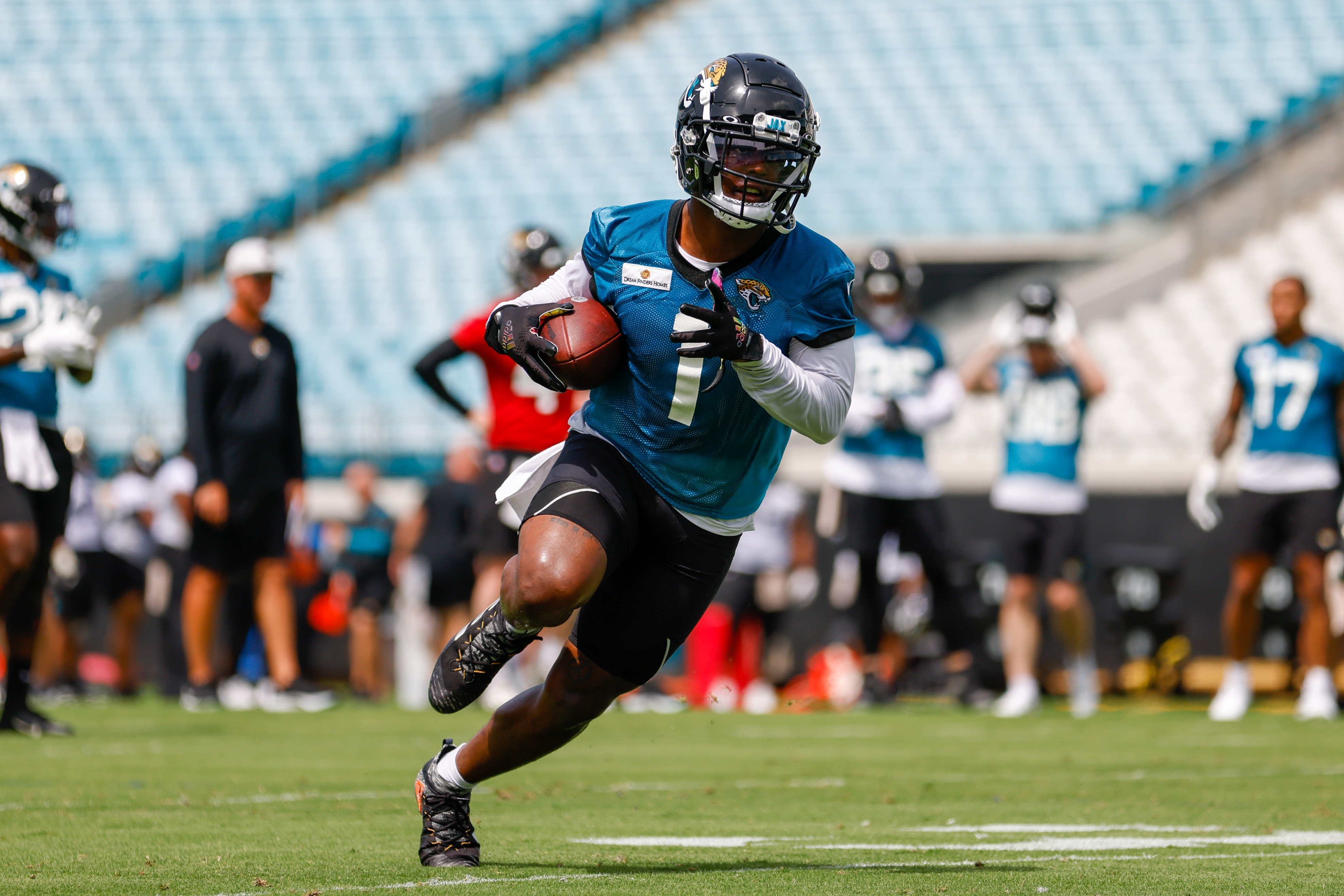 JACKSONVILLE, FL - MAY 23: Jacksonville Jaguars Running Back Travis Etienne Jr. (1) during Jacksonville Jaguars OTA Offseason Workouts on May 23, 2022 at TIAA Bank Field in Jacksonville, Fl. (Photo by David Rosenblum/Icon Sportswire via Getty Images)