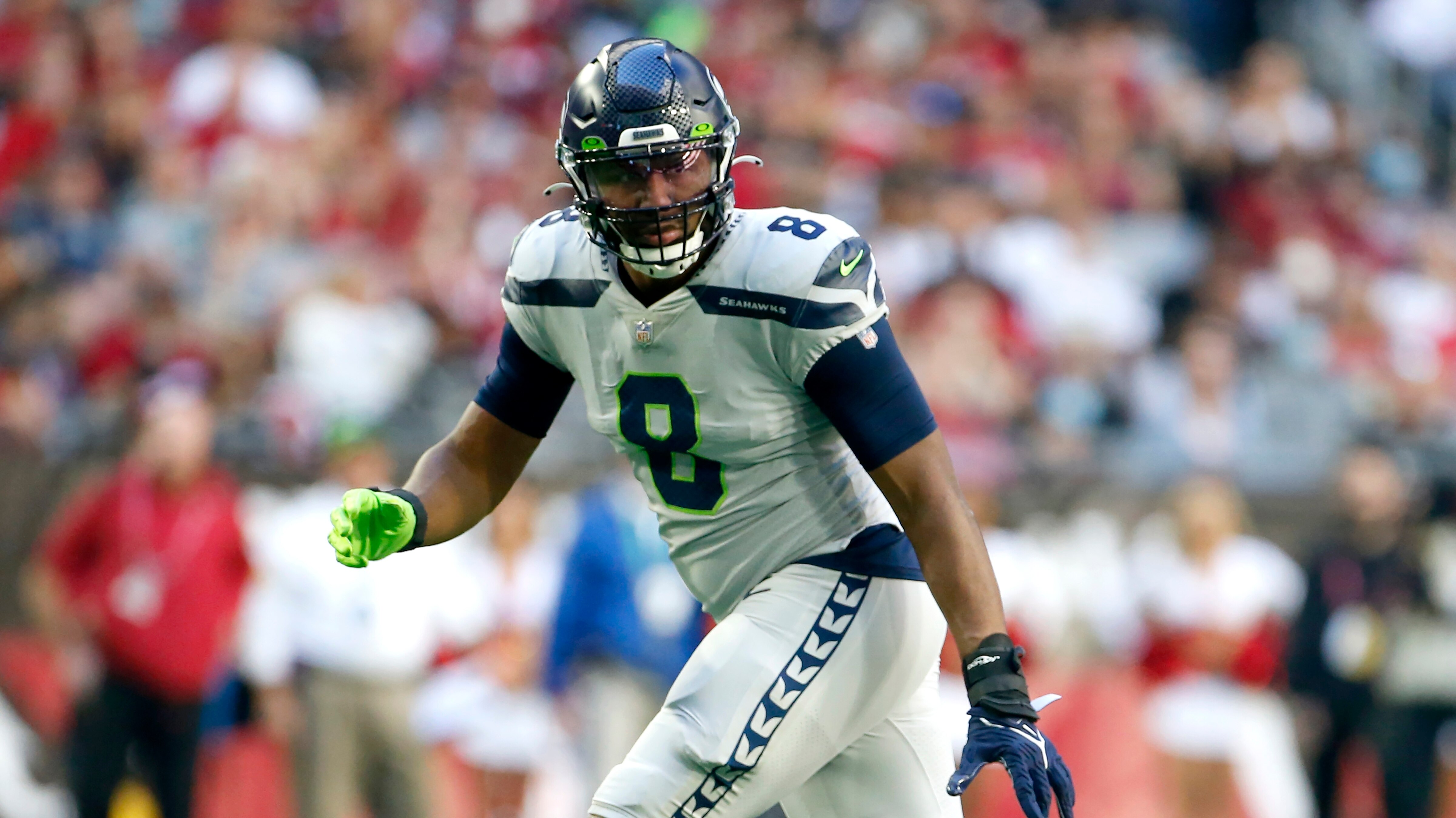 Seattle Seahawks defensive end Carlos Dunlap drops into coverage during the first half of an NFL football game against the Arizona Cardinals Sunday, Jan. 9, 2022, in Glendale, Ariz. (AP Photo/Ralph Freso)