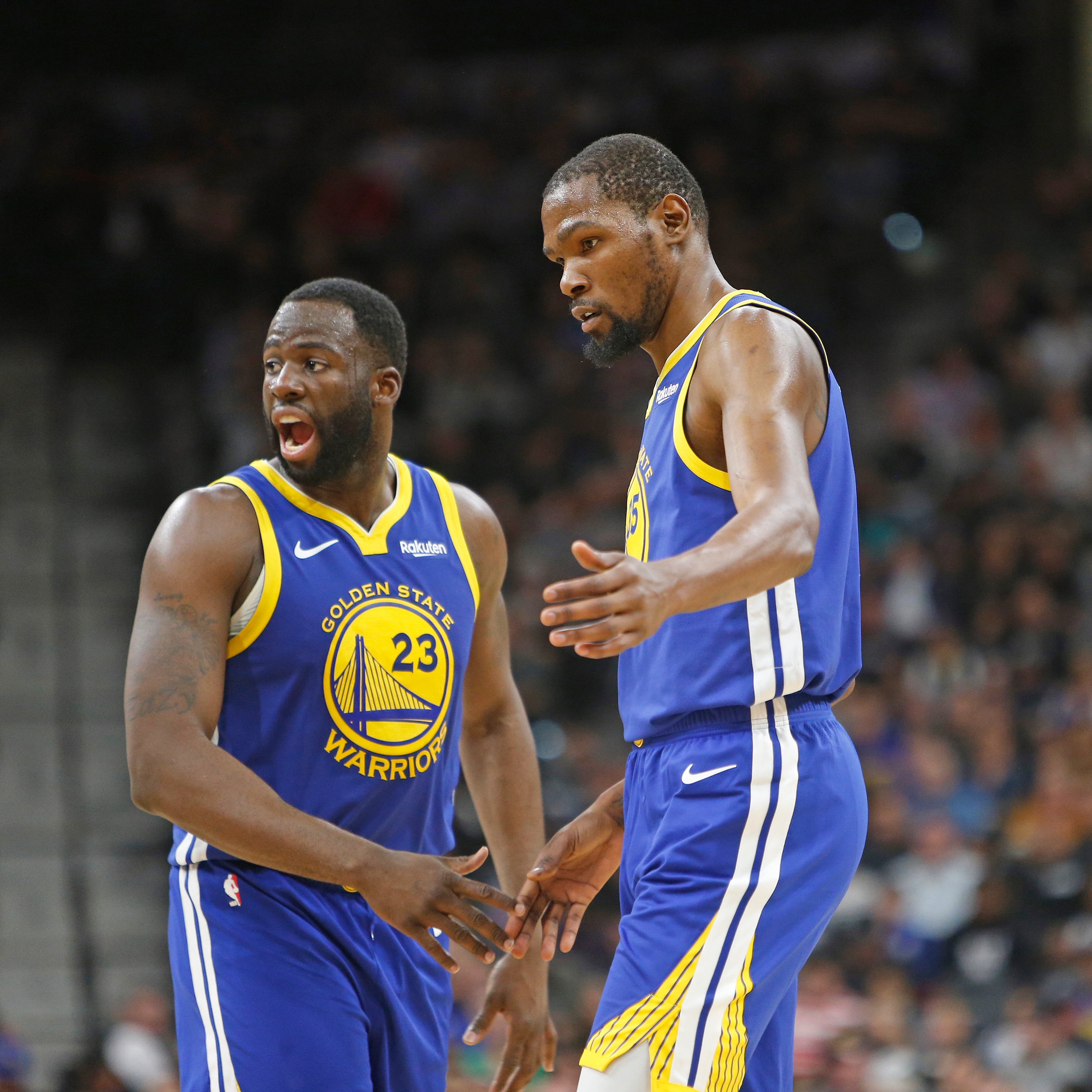 SAN ANTONIO, TX - MARCH 18: Kevin Durant #35 of the Golden State Warriors gets congratulations from Draymond Green #23 after making a basket against the San Antonio Spurs  at AT&T Center on March 18, 2019 in San Antonio, Texas.  NOTE TO USER: User expressly acknowledges and agrees that , by downloading and or using this photograph, User is consenting to the terms and conditions of the Getty Images License Agreement. (Photo by Ronald Cortes/Getty Images)