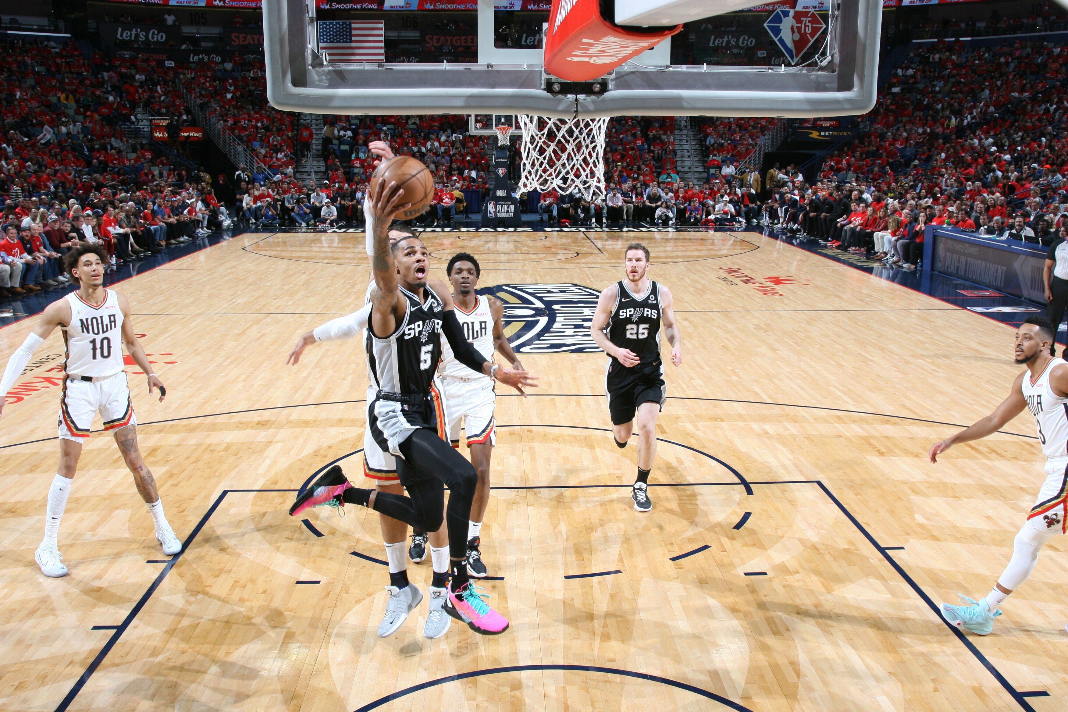 NEW ORLEANS, LA - APRIL 13: Dejounte Murray #5 of the San Antonio Spurs shoots the ball during the game New Orleans Pelicans on April 13, 2022 at the Smoothie King Center in New Orleans, Louisiana. NOTE TO USER: User expressly acknowledges and agrees that, by downloading and or using this Photograph, user is consenting to the terms and conditions of the Getty Images License Agreement. Mandatory Copyright Notice: Copyright 2022 NBAE (Photo by Layne Murdoch Jr./NBAE via Getty Images)