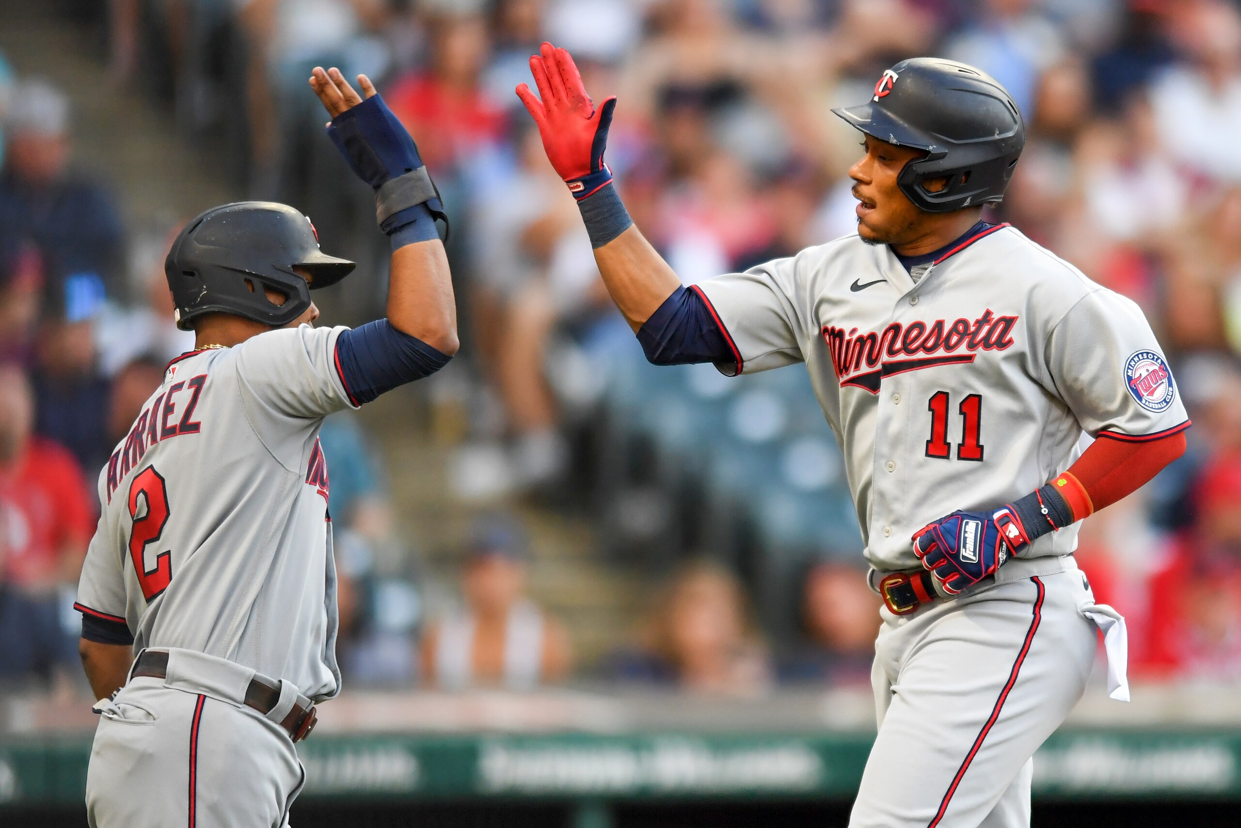 CLEVELAND, OH - JUNE 28: Luis Arráez #2 and Jorge Polanco #11 of the Minnesota Twins celebrates Polanco's two-run home against  Konnor Pilkington of the Cleveland Guardians in the third inning of game two of a doubleheader at Progressive Field on June 28, 2022 in Cleveland, Ohio. (Photo by Nick Cammett/Getty Images)