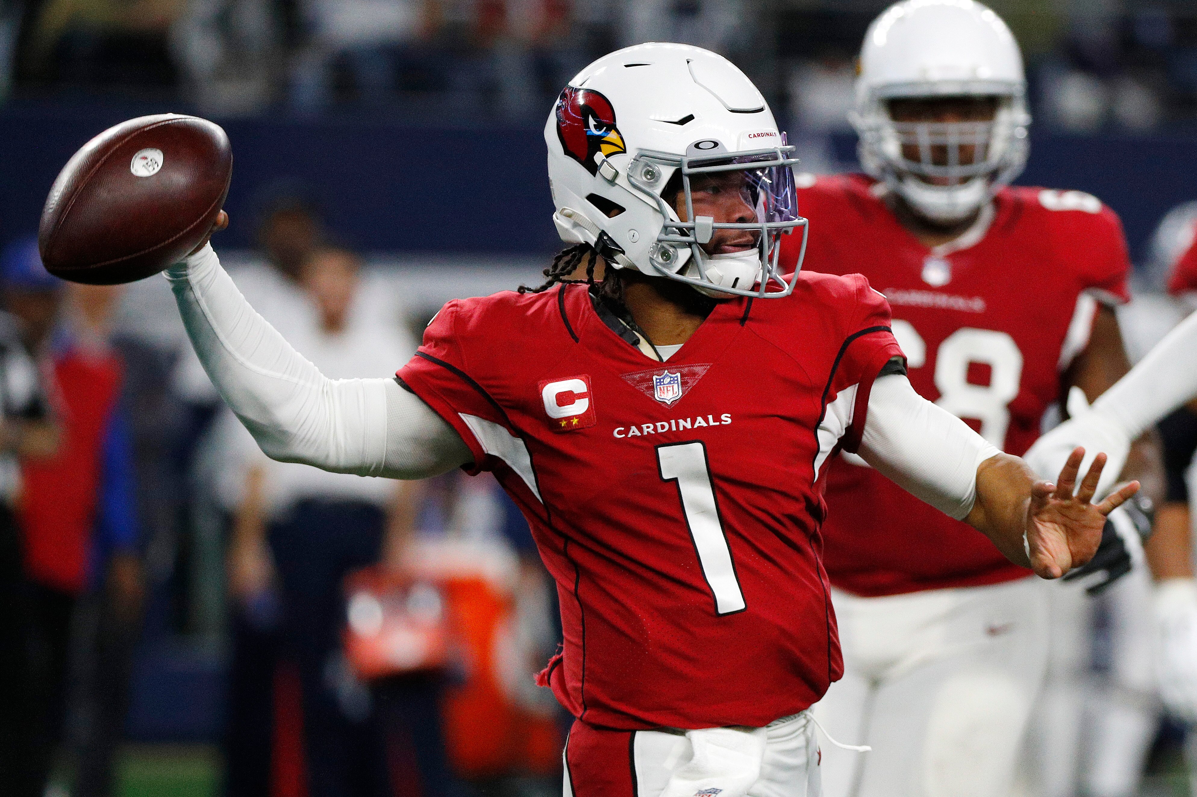 ARLINGTON, TEXAS - JANUARY 02: Kyler Murray #1 of the Arizona Cardinals throws the ball during the fourth quarter against the Dallas Cowboys at AT&T Stadium on January 02, 2022 in Arlington, Texas. (Photo by Richard Rodriguez/Getty Images)