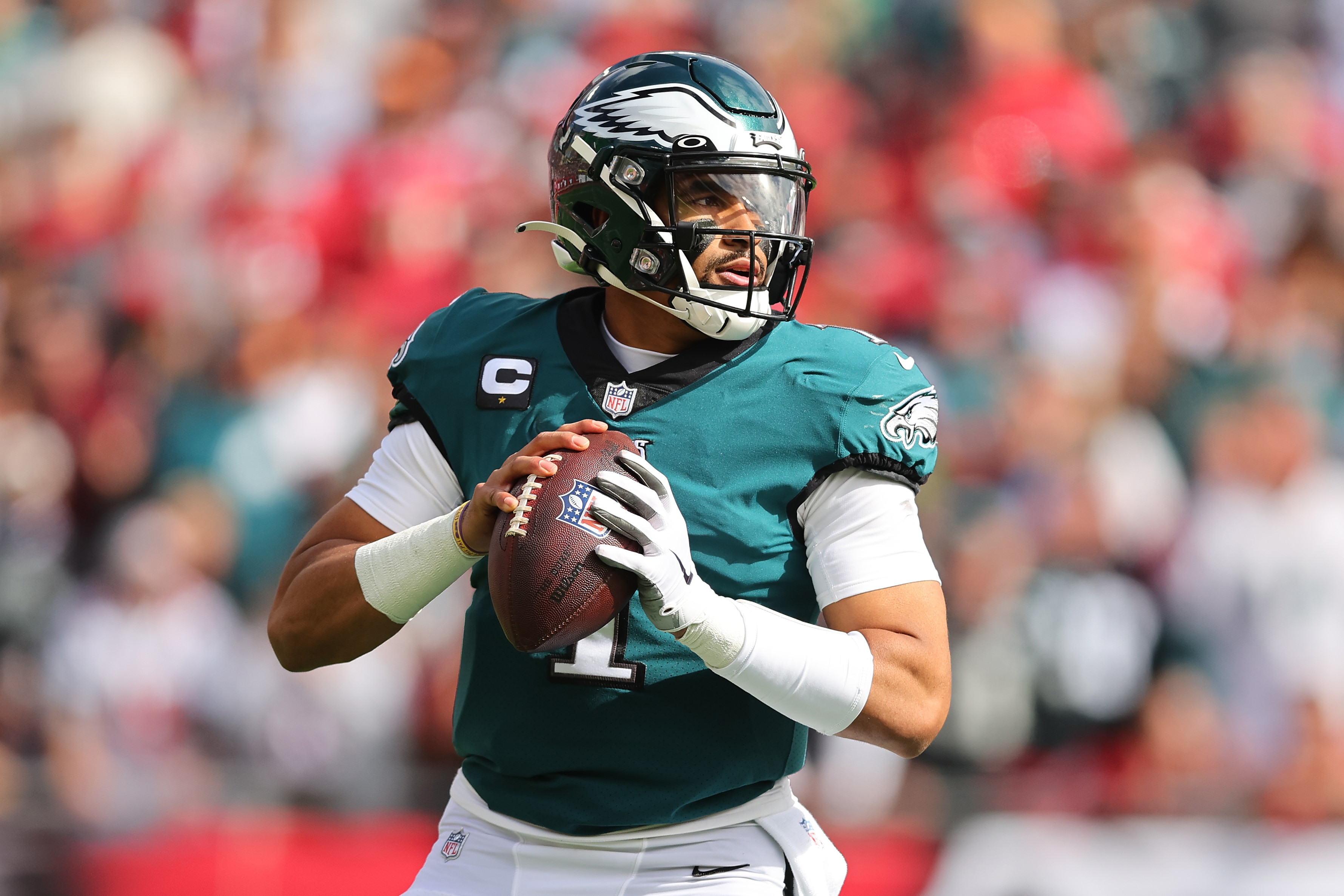 TAMPA, FLORIDA - JANUARY 16: Jalen Hurts #1 of the Philadelphia Eagles in action against the Tampa Bay Buccaneers in the first half of the NFC Wild Card Playoff game at Raymond James Stadium on January 16, 2022 in Tampa, Florida.  (Photo by Michael Reaves/Getty Images)