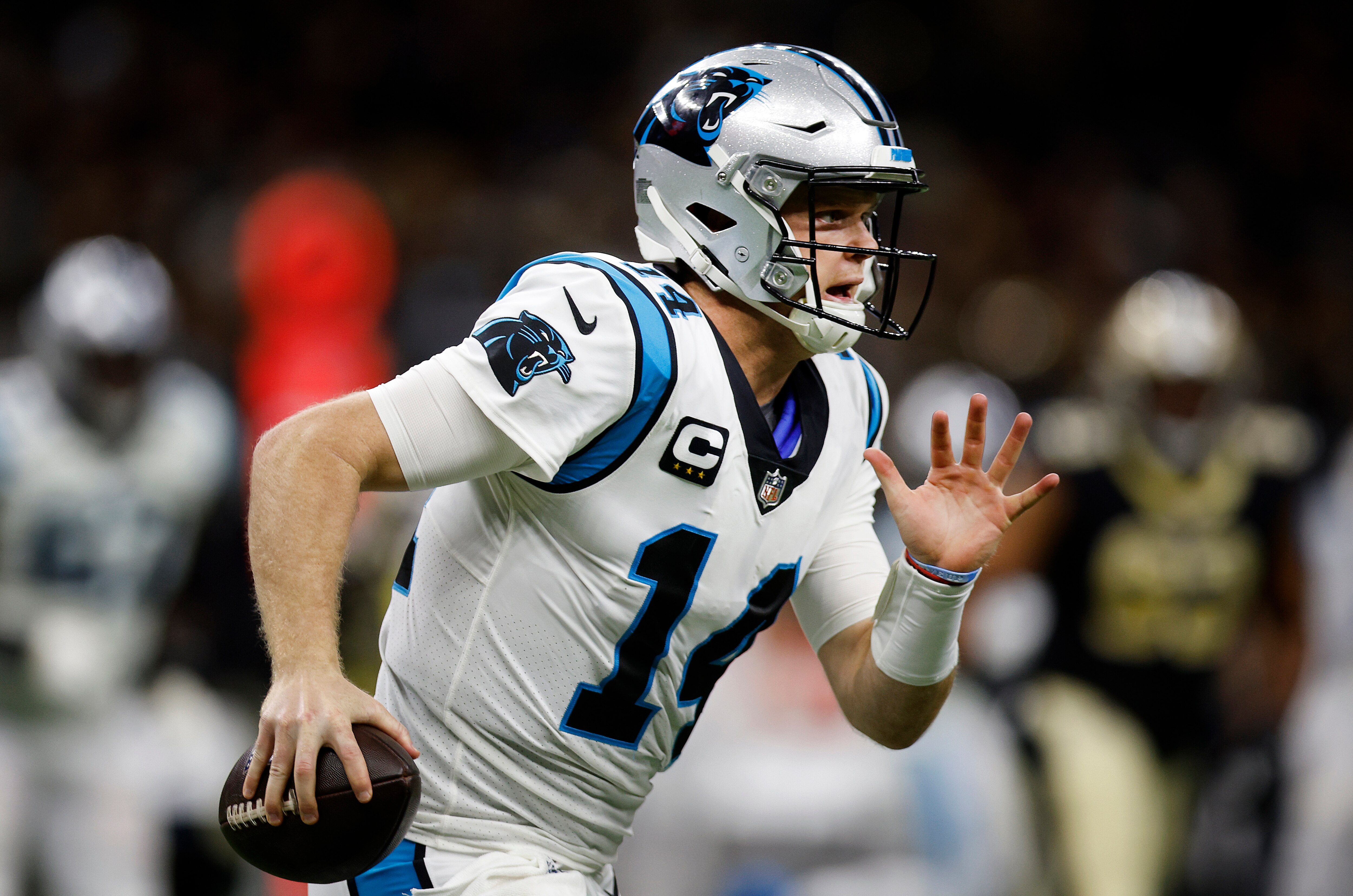 NEW ORLEANS, LOUISIANA - JANUARY 02: Sam Darnold #14 of the Carolina Panthers runs with the ball in the first quarter of the game against the New Orleans Saints at Caesars Superdome on January 02, 2022 in New Orleans, Louisiana. (Photo by Chris Graythen/Getty Images)