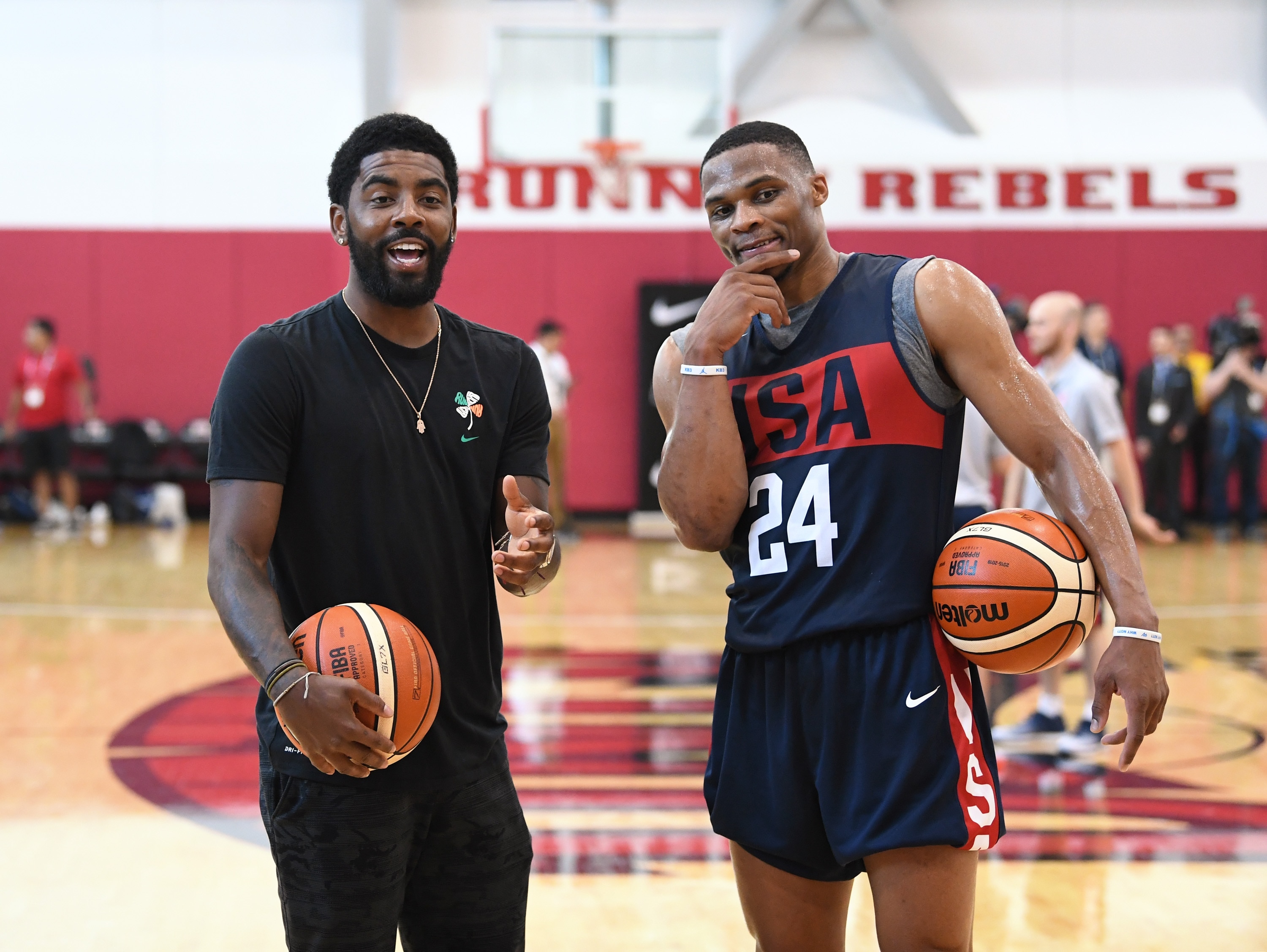 LAS VEGAS, NV - JULY 26:  Kyrie Irving #37 and Russell Westbrook #24 of the United States joke around during a practice session at the 2018 USA Basketball Men's National Team minicamp at the Mendenhall Center at UNLV on July 26,  2018 in Las Vegas, Nevada.  (Photo by Ethan Miller/Getty Images)
