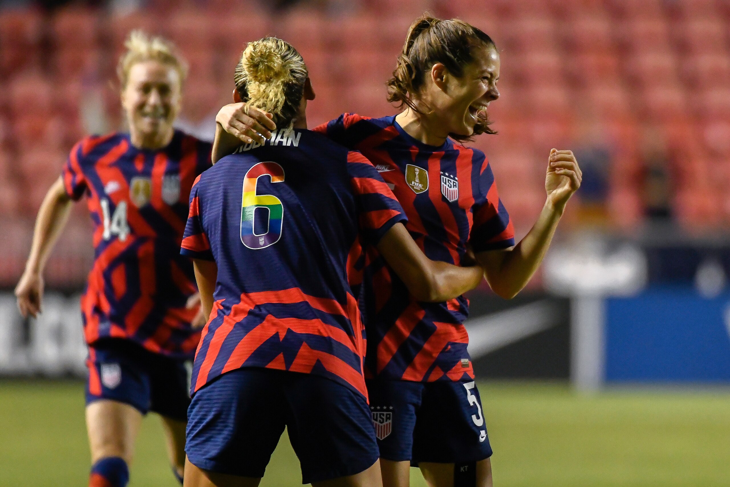 SANDY, UTAH - JUNE 28: Kelley O'Hara #5 of the United States celebrates a goal with teammate Trinity Rodman #6 during a game against Colombia at Rio Tinto Stadium on June 28, 2022 in Sandy, Utah. (Photo by Alex Goodlett/Getty Images)