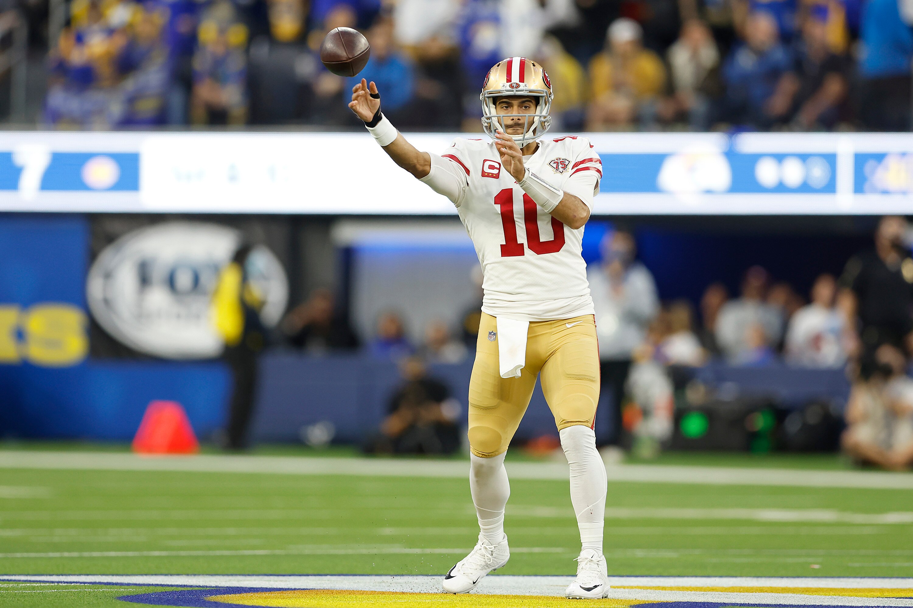 INGLEWOOD, CALIFORNIA - JANUARY 30: Jimmy Garoppolo #10 of the San Francisco 49ers passes in the second quarter against the Los Angeles Rams in the NFC Championship Game at SoFi Stadium on January 30, 2022 in Inglewood, California. (Photo by Christian Petersen/Getty Images)