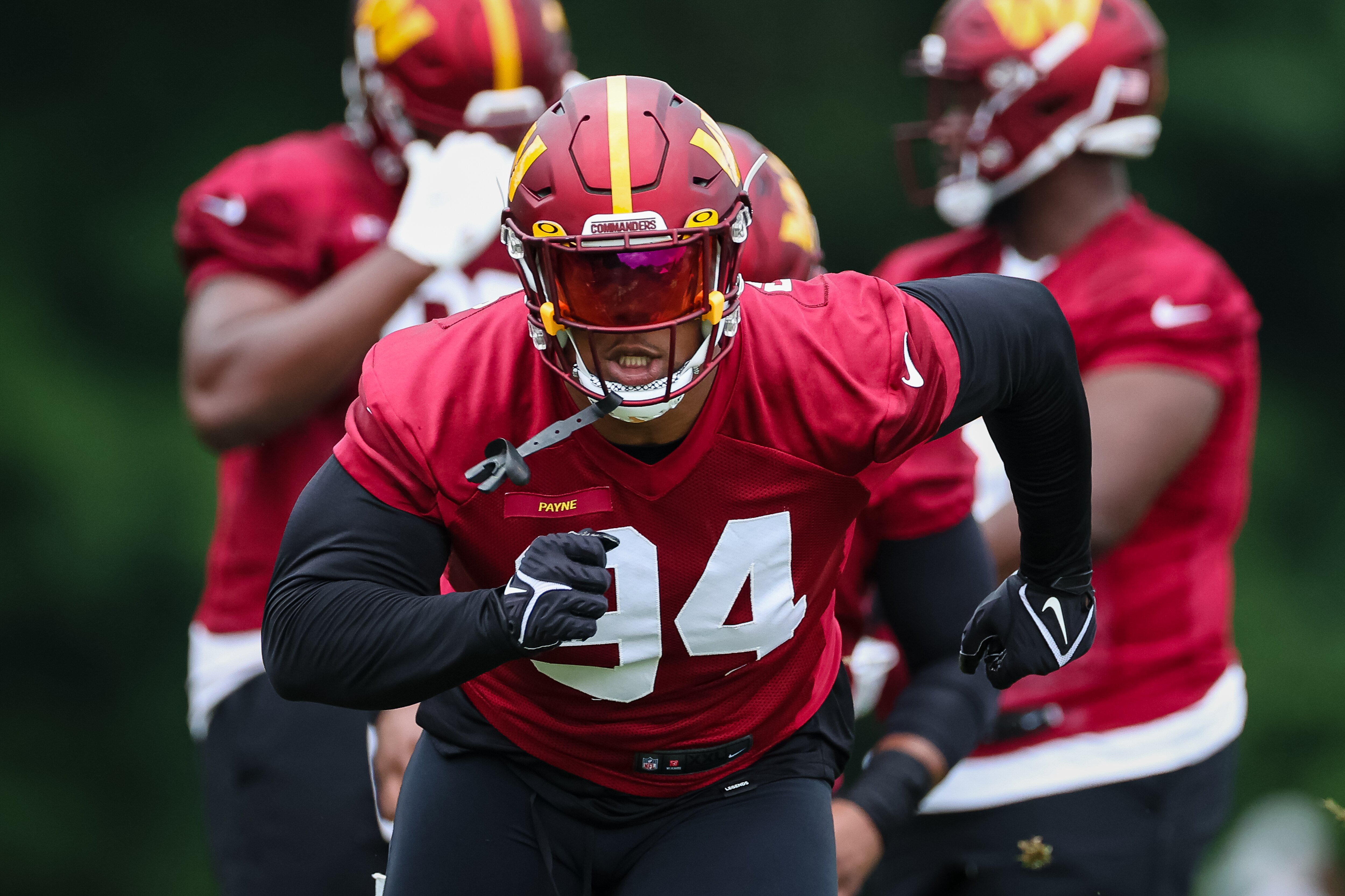 ASHBURN, VA - JUNE 14: Daron Payne #94 of the Washington Commanders participates in a drill during the organized team activity at INOVA Sports Performance Center on June 14, 2022 in Ashburn, Virginia. (Photo by Scott Taetsch/Getty Images)