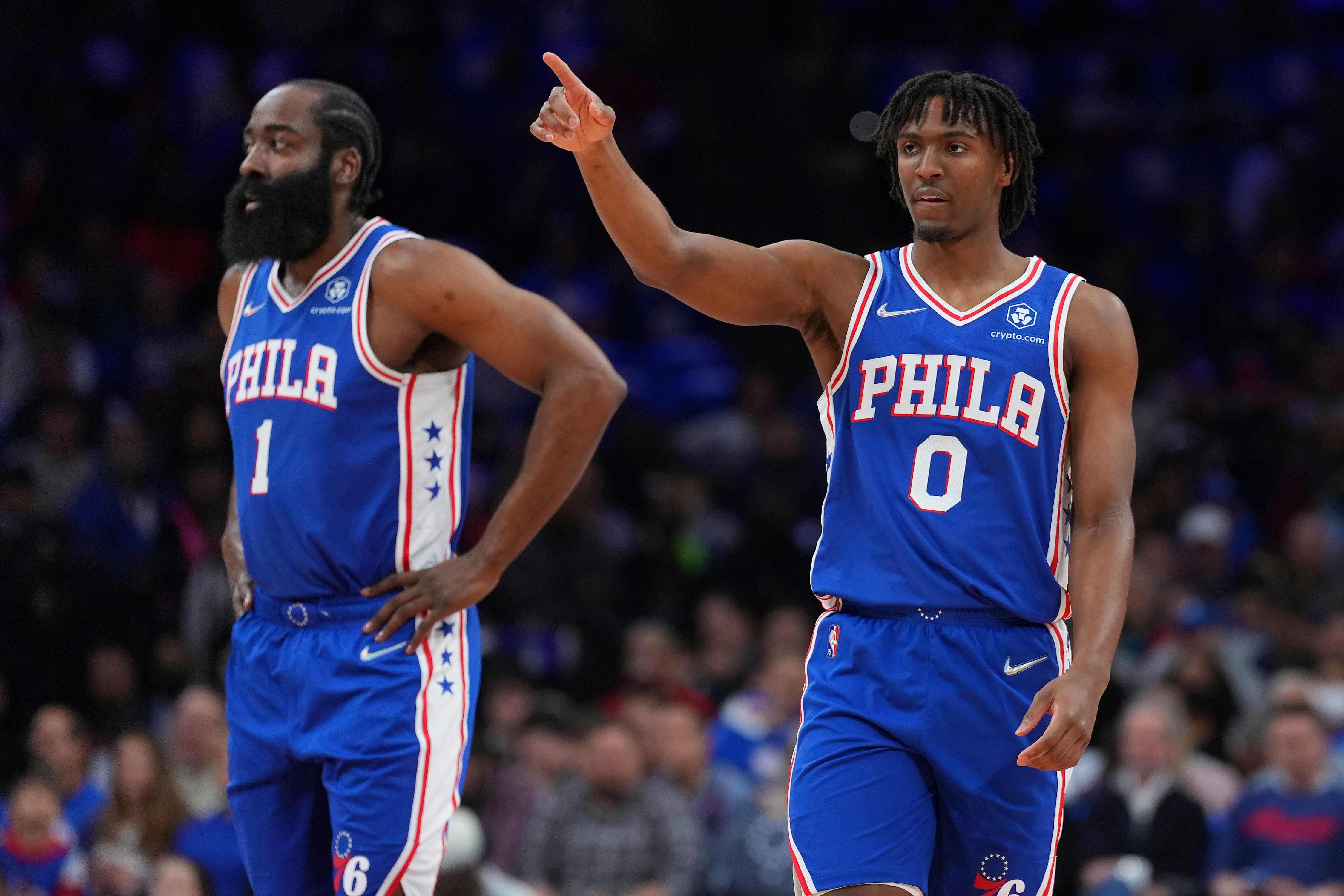 PHILADELPHIA, PA - MAY 06: James Harden #1 and Tyrese Maxey #0 of the Philadelphia 76ers look on against the Miami Heat during Game Three of the 2022 NBA Playoffs Eastern Conference Semifinals at the Wells Fargo Center on May 6, 2022 in Philadelphia, Pennsylvania. The 76ers defeated the Heat 99-79. NOTE TO USER: User expressly acknowledges and agrees that, by downloading and or using this photograph, User is consenting to the terms and conditions of the Getty Images License Agreement. (Photo by Mitchell Leff/Getty Images)
