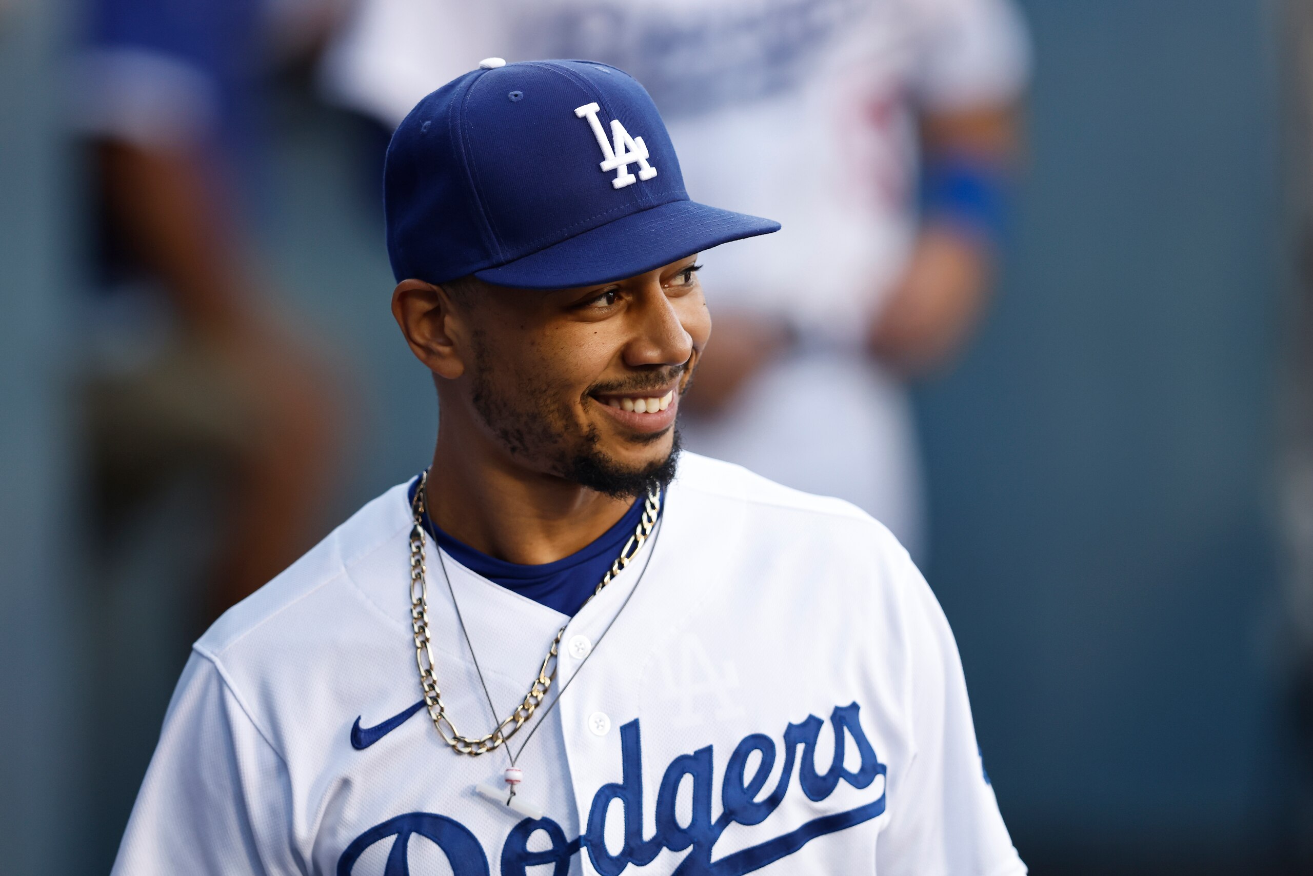 LOS ANGELES, CALIFORNIA - JUNE 14: Mookie Betts #50 of the Los Angeles Dodgers reacts in the dugout prior to a game against the Los Angeles Angels at Dodger Stadium on June 14, 2022 in Los Angeles, California. (Photo by Michael Owens/Getty Images)