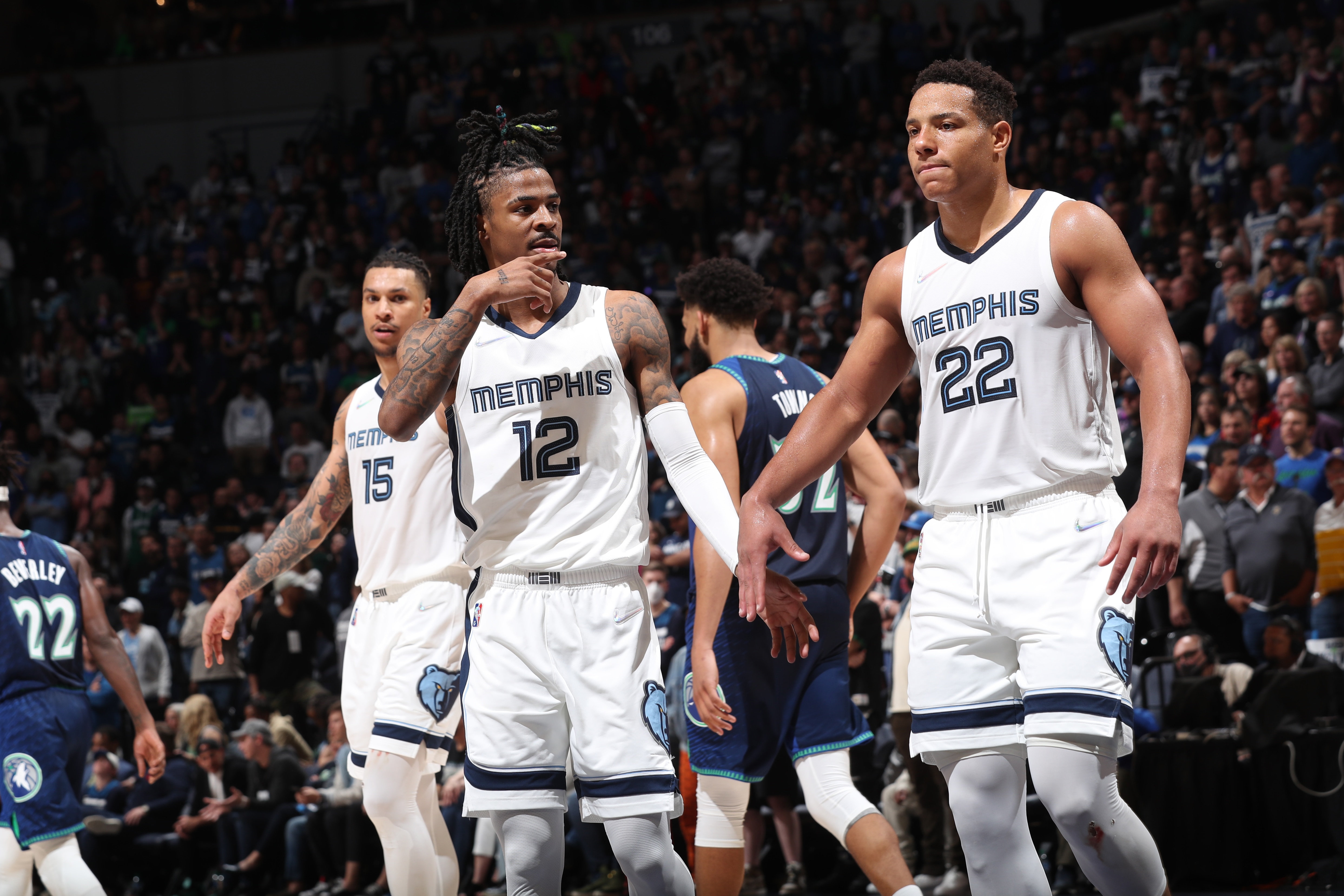 MINNEAPOLIS, MN -  APRIL 29: Ja Morant #12 of the Memphis Grizzlies high fives Desmond Bane #22 of the Memphis Grizzlies during Round 1 Game 6 of the 2022 NBA Playoffs on April 29, 2022 at Target Center in Minneapolis, Minnesota. NOTE TO USER: User expressly acknowledges and agrees that, by downloading and or using this Photograph, user is consenting to the terms and conditions of the Getty Images License Agreement. Mandatory Copyright Notice: Copyright 2022 NBAE (Photo by Joe Murphy/NBAE via Getty Images)