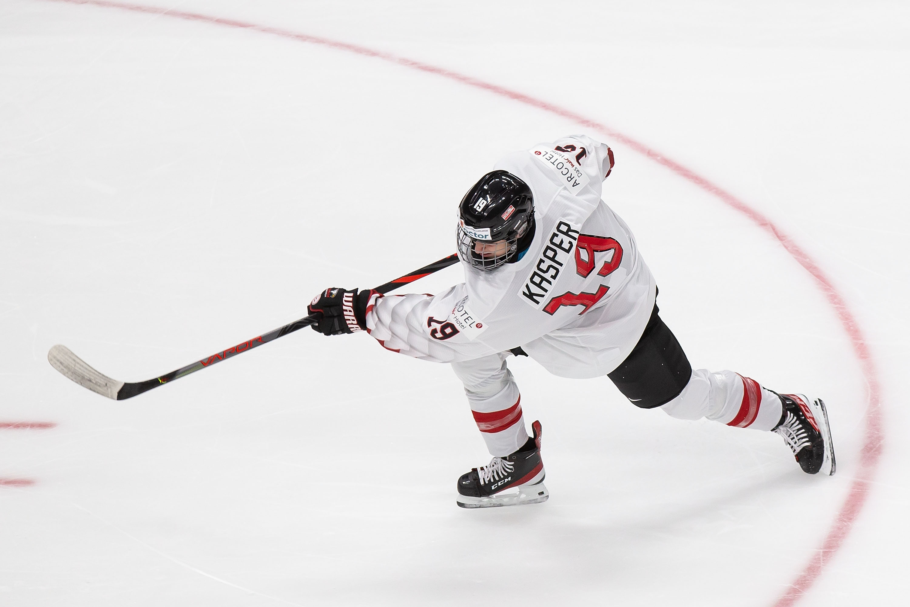 EDMONTON, AB - DECEMBER 26: Marco Kasper #19 of Austria skates against the United States during the 2021 IIHF World Junior Championship at Rogers Place on December 26, 2020 in Edmonton, Canada. (Photo by Codie McLachlan/Getty Images)