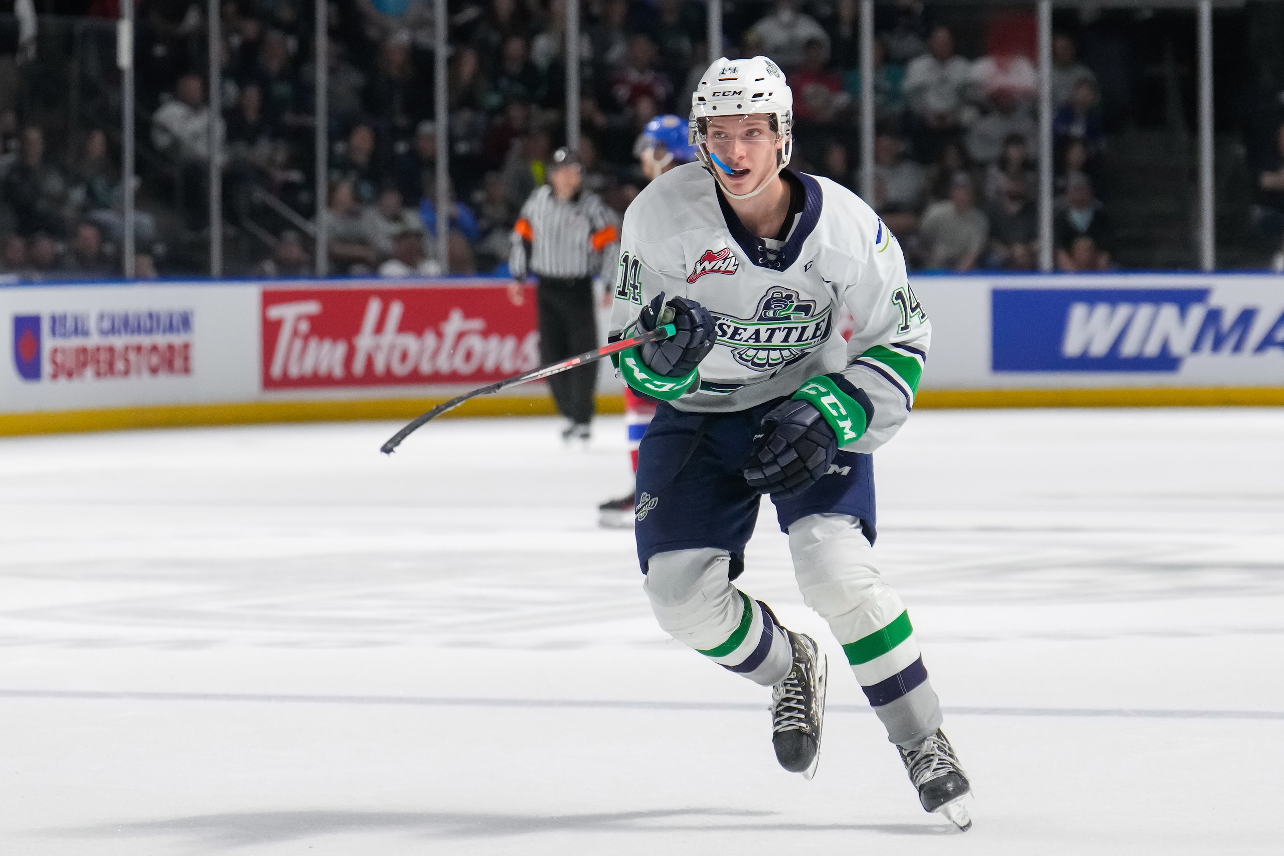 KENT, WASHINGTON - JUNE 07: Kevin Korchinski #14 of the Seattle Thunderbirds skates back for the puck against the Edmonton Oil Kings during the third period of Game 3 of the Western Hockey League Championship at accesso ShoWare Center on June 07, 2022 in Kent, Washington. (Photo by Christopher Mast/Getty Images)