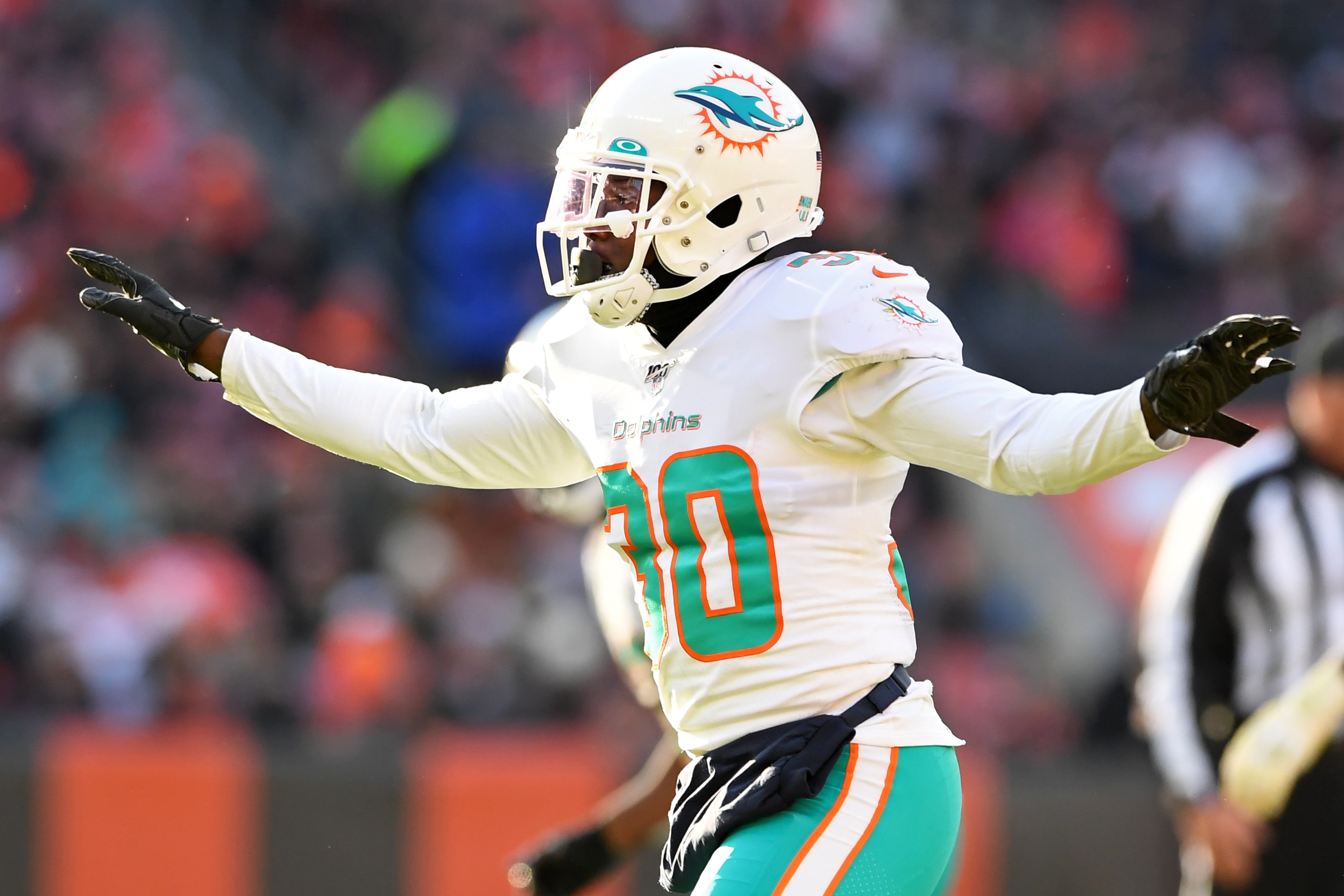 CLEVELAND, OH - NOVEMBER 24, 2019: Defensive back Chris Lammons #30 of the Miami Dolphins celebrates a third down sack by linebacker Charles Harris #90 in the third quarter of a game against the Cleveland Browns on November 24, 2019 at FirstEnergy Stadium in Cleveland, Ohio. Cleveland won 41-24. (Photo by: 2019 Nick Cammett/Diamond Images via Getty Images)
