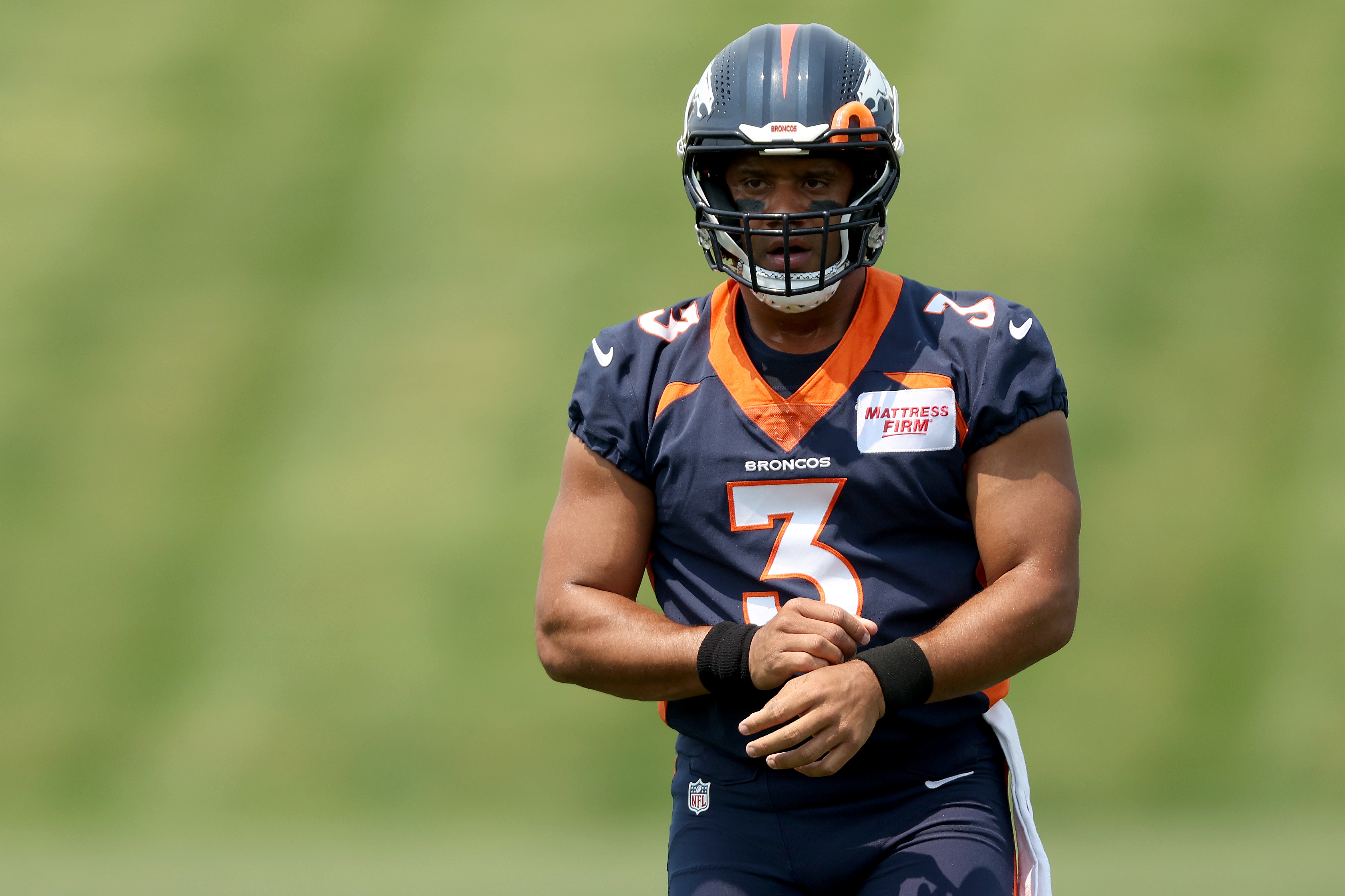 ENGLEWOOD, COLORADO - JUNE 13: Quarterback Russell Wilson #3 of the Denver Broncos attends their mandatory mini-camp at UCHealth Training Center on June 13, 2022 in Englewood, Colorado. (Photo by Matthew Stockman/Getty Images)
