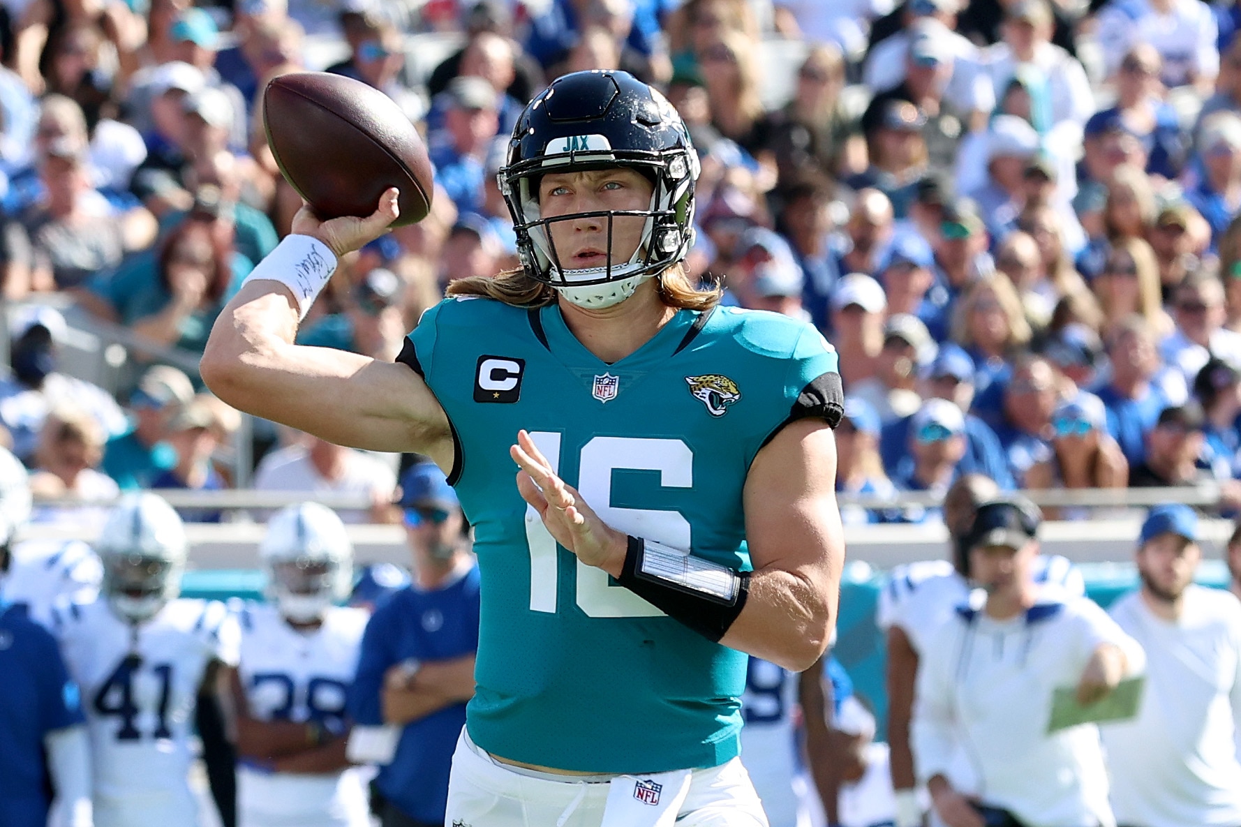 JACKSONVILLE, FLORIDA - JANUARY 09: Trevor Lawrence #16 of the Jacksonville Jaguars attempts a pass during the game against the Indianapolis Colts at TIAA Bank Field on January 09, 2022 in Jacksonville, Florida. (Photo by Sam Greenwood/Getty Images)