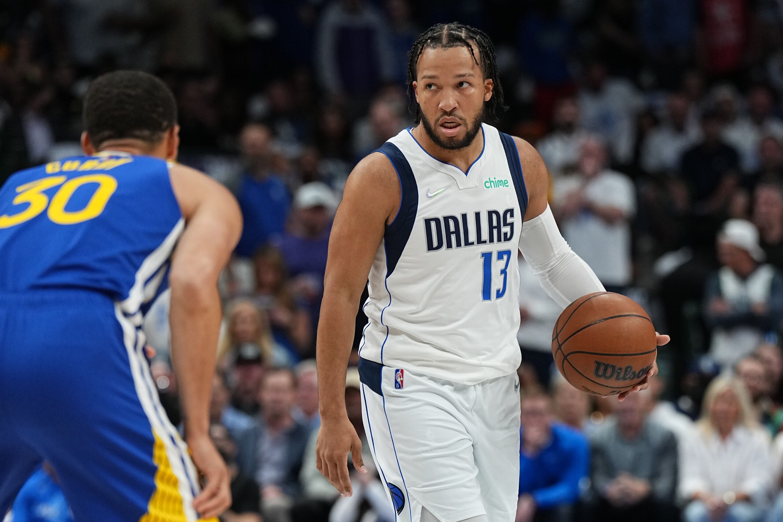 DALLAS, TX - MAY 24: Jalen Brunson #13 of the Dallas Mavericks dribbles the ball during Game 4 of the 2022 NBA Playoffs Western Conference Finals against the Golden State Warriors on May 24, 2022 at the American Airlines Center in Dallas, Texas. NOTE TO USER: User expressly acknowledges and agrees that, by downloading and or using this photograph, User is consenting to the terms and conditions of the Getty Images License Agreement. Mandatory Copyright Notice: Copyright 2022 NBAE (Photo by Glenn James/NBAE via Getty Images) DALLAS, TX - MAY 24: Jalen Brunson #13 of the Dallas Mavericks dribbles the ball during Game 4 of the 2022 NBA Playoffs Western Conference Finals against the Golden State Warriors on May 24, 2022 at the American Airlines Center in Dallas, Texas. NOTE TO USER: User expressly acknowledges and agrees that, by downloading and or using this photograph, User is consenting to the terms and conditions of the Getty Images License Agreement. Mandatory Copyright Notice: Copyright 2022 NBAE (Photo by Glenn James/NBAE via Getty Images)